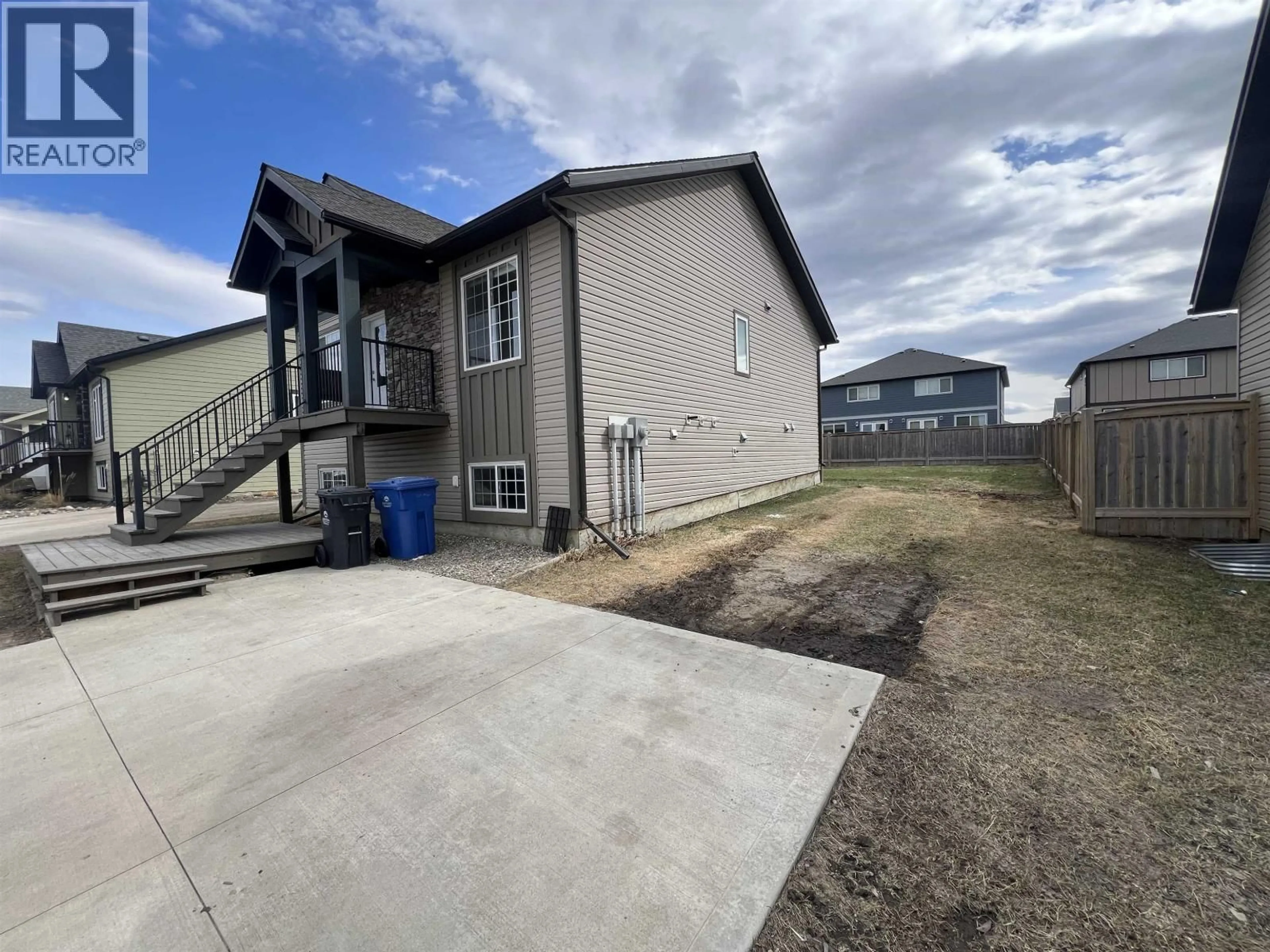 A pic from outside/outdoor area/front of a property/back of a property/a pic from drone, unknown for 11011 105 AVENUE, Fort St. John British Columbia V1J0L5