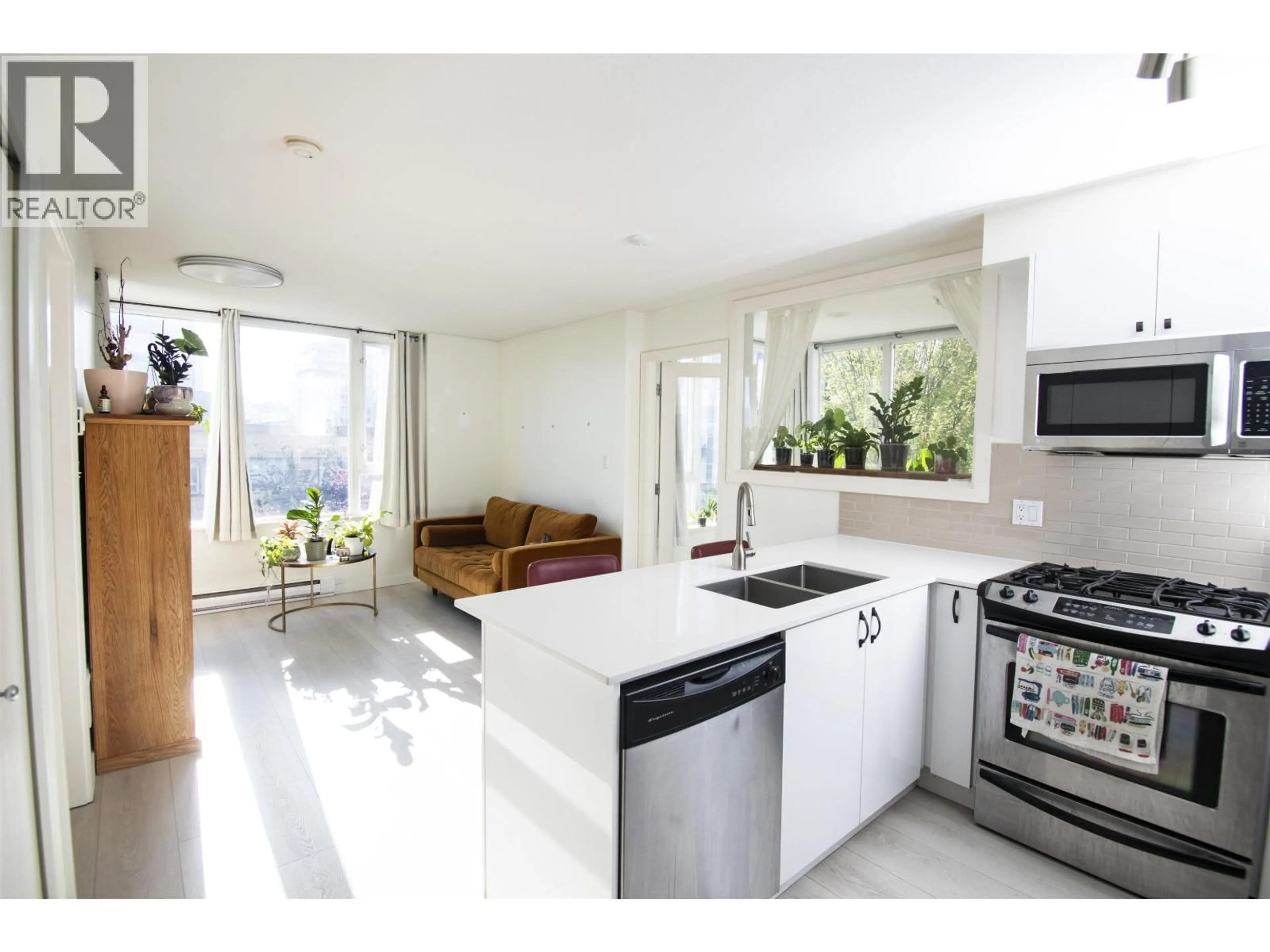 Open concept kitchen, ceramic/tile floor for 204 - 2483 SPRUCE STREET, Vancouver British Columbia V6H4J2