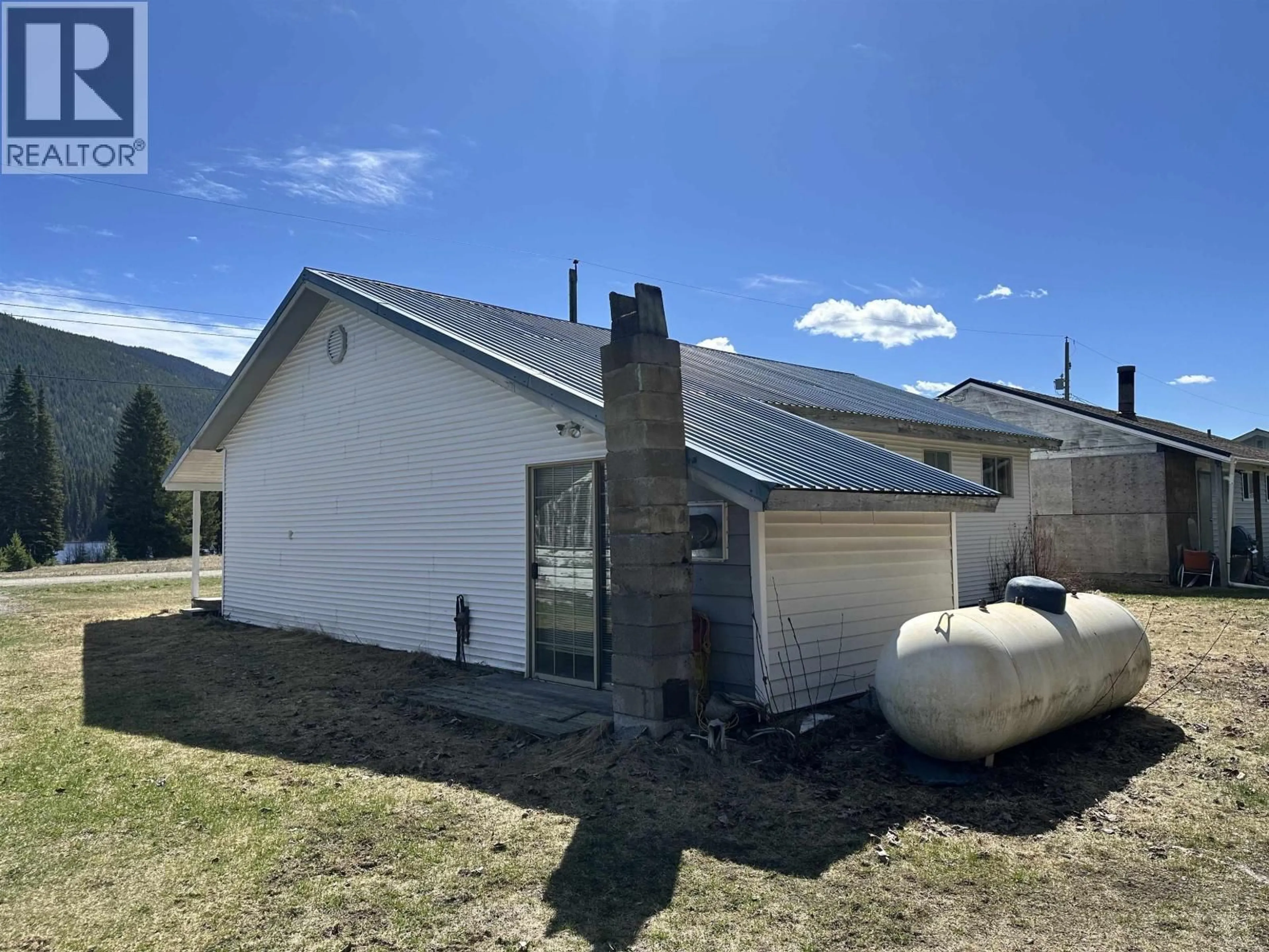 A pic from outside/outdoor area/front of a property/back of a property/a pic from drone, building for 629 A ROAD, Canim Lake British Columbia V0K1L0