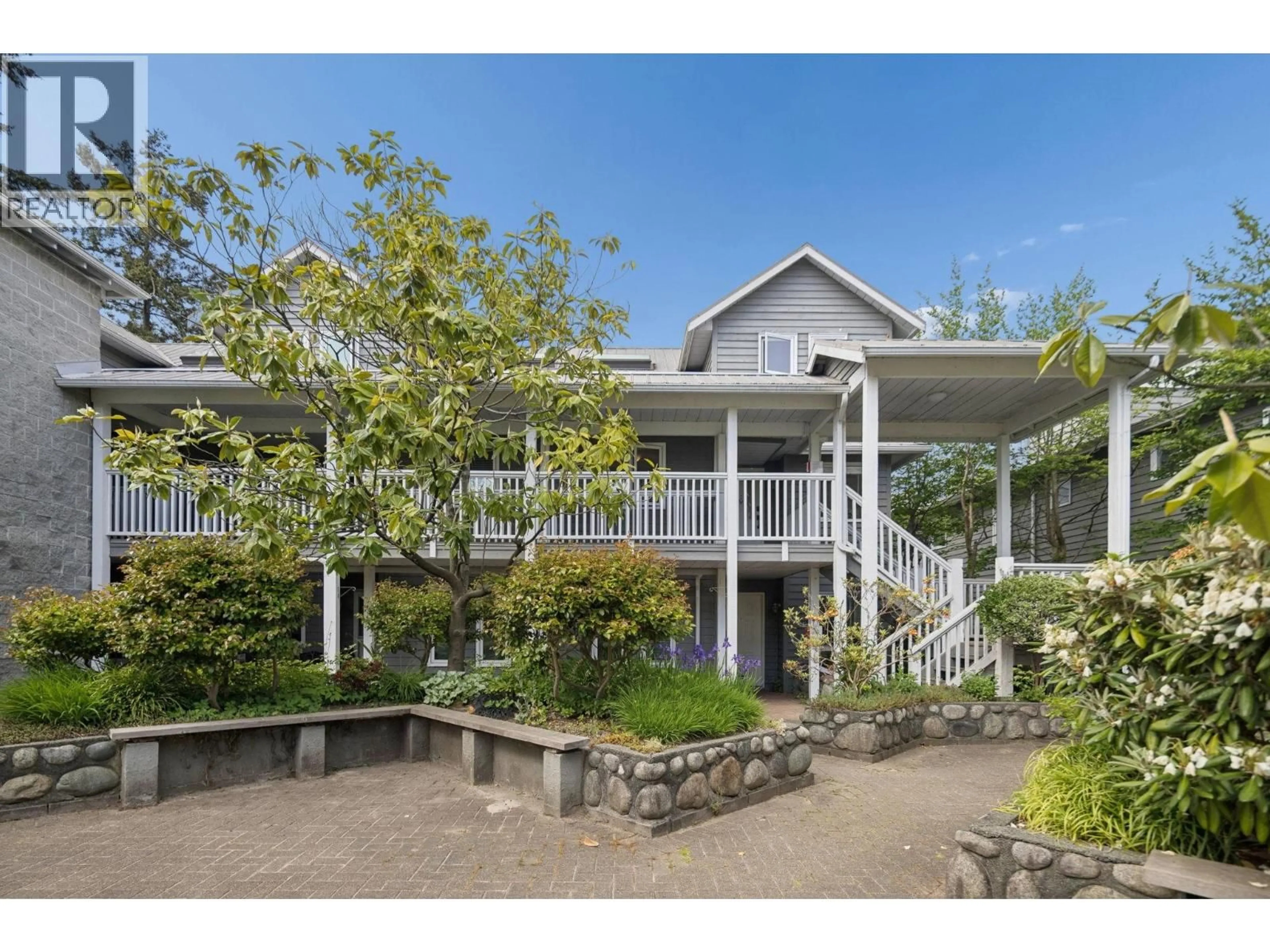 A pic from outside/outdoor area/front of a property/back of a property/a pic from drone, unknown for 207 - 1518 BOWSER AVENUE, North Vancouver British Columbia V7P2Y3