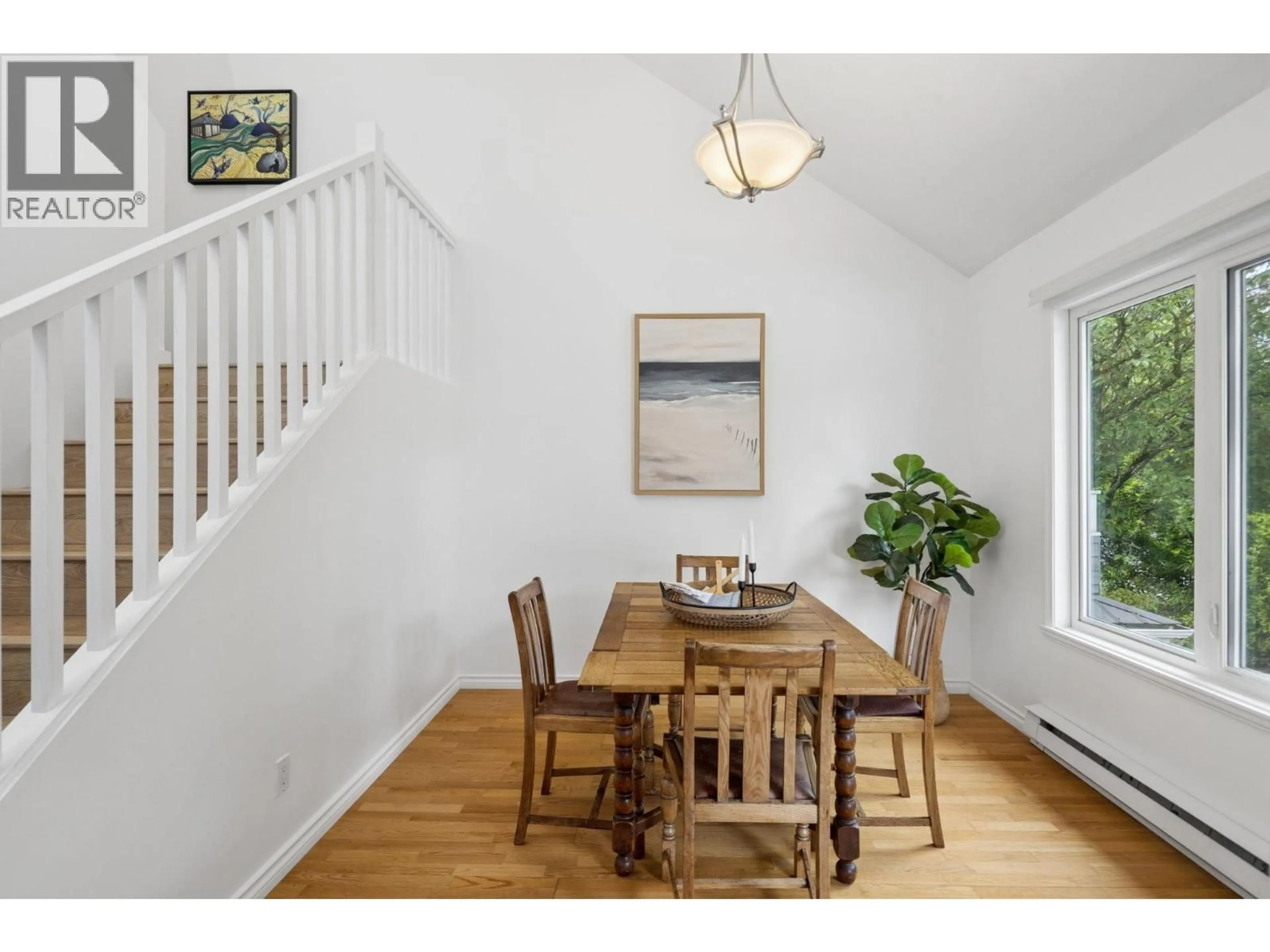 Dining room, wood/laminate floor for 207 - 1518 BOWSER AVENUE, North Vancouver British Columbia V7P2Y3