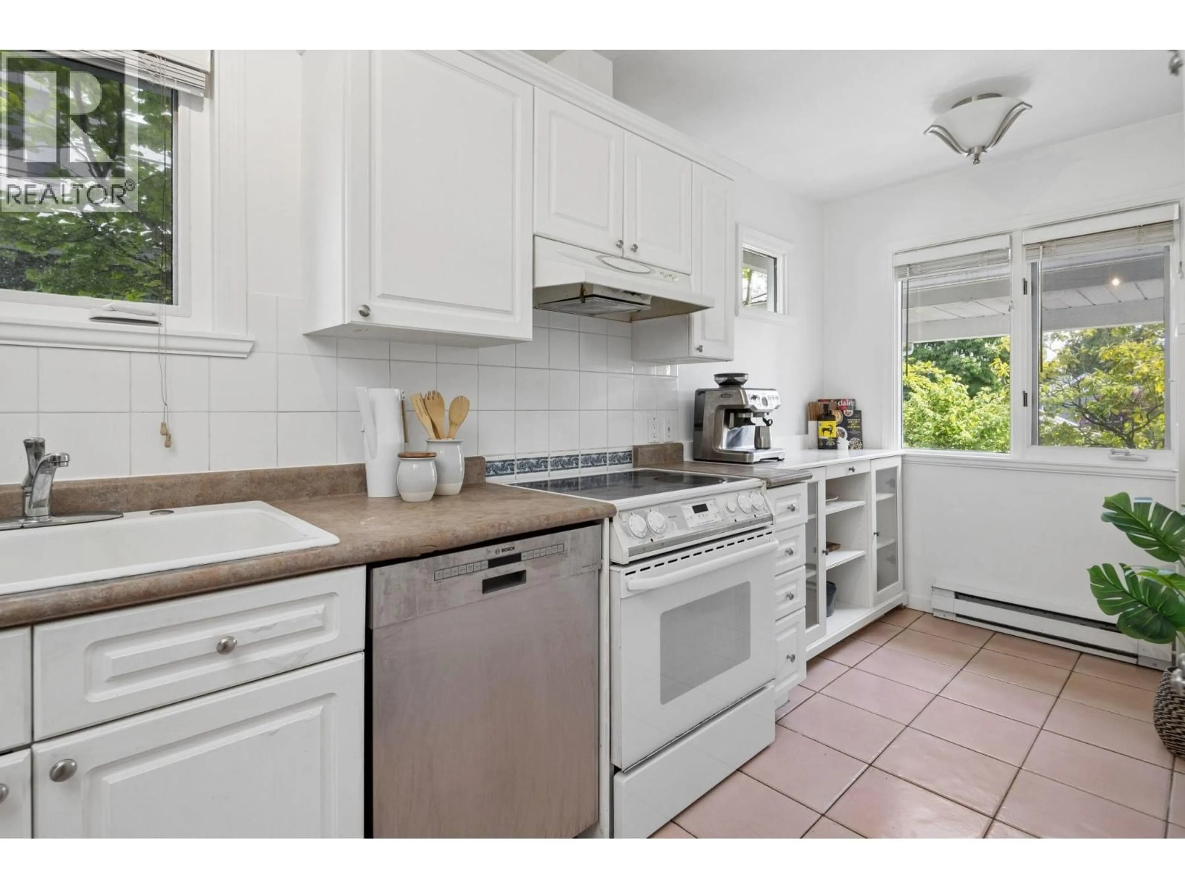 Standard kitchen, ceramic/tile floor for 207 - 1518 BOWSER AVENUE, North Vancouver British Columbia V7P2Y3