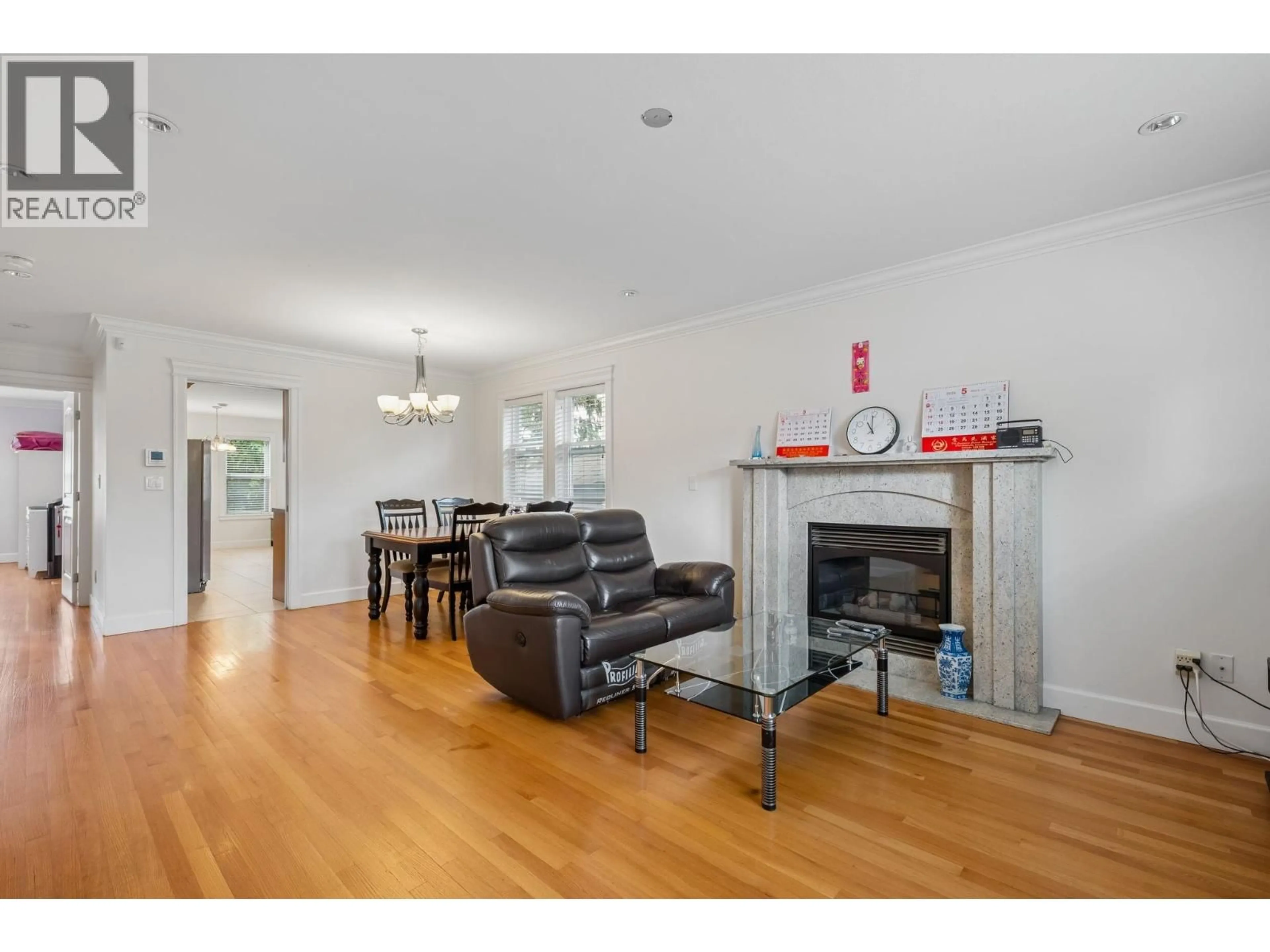 Living room with furniture, wood/laminate floor for 3795 FLEMING STREET, Vancouver British Columbia V5N3W1