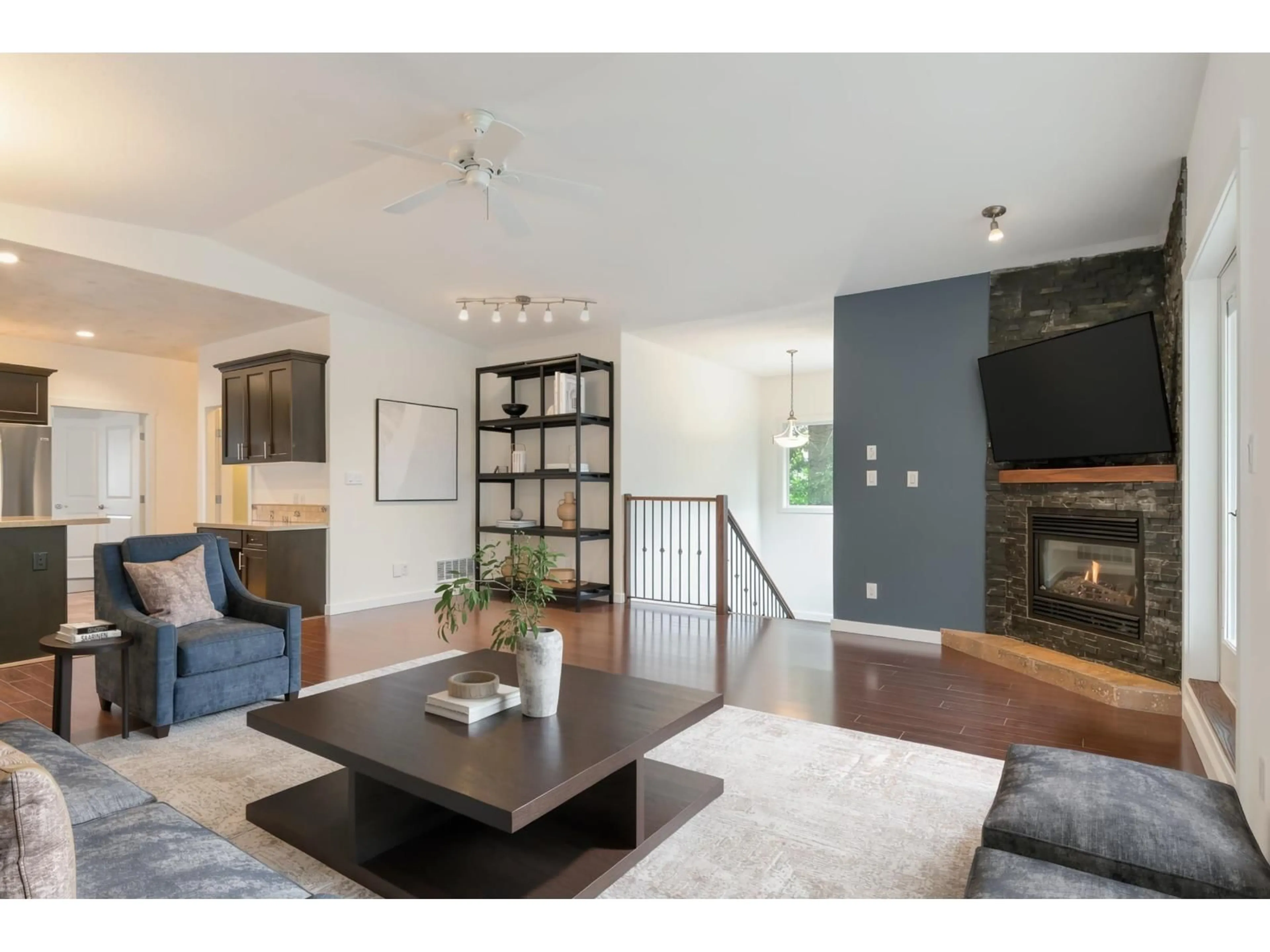 Living room with furniture, wood/laminate floor for 34028 WALNUT AVENUE, Abbotsford British Columbia V2S2S5