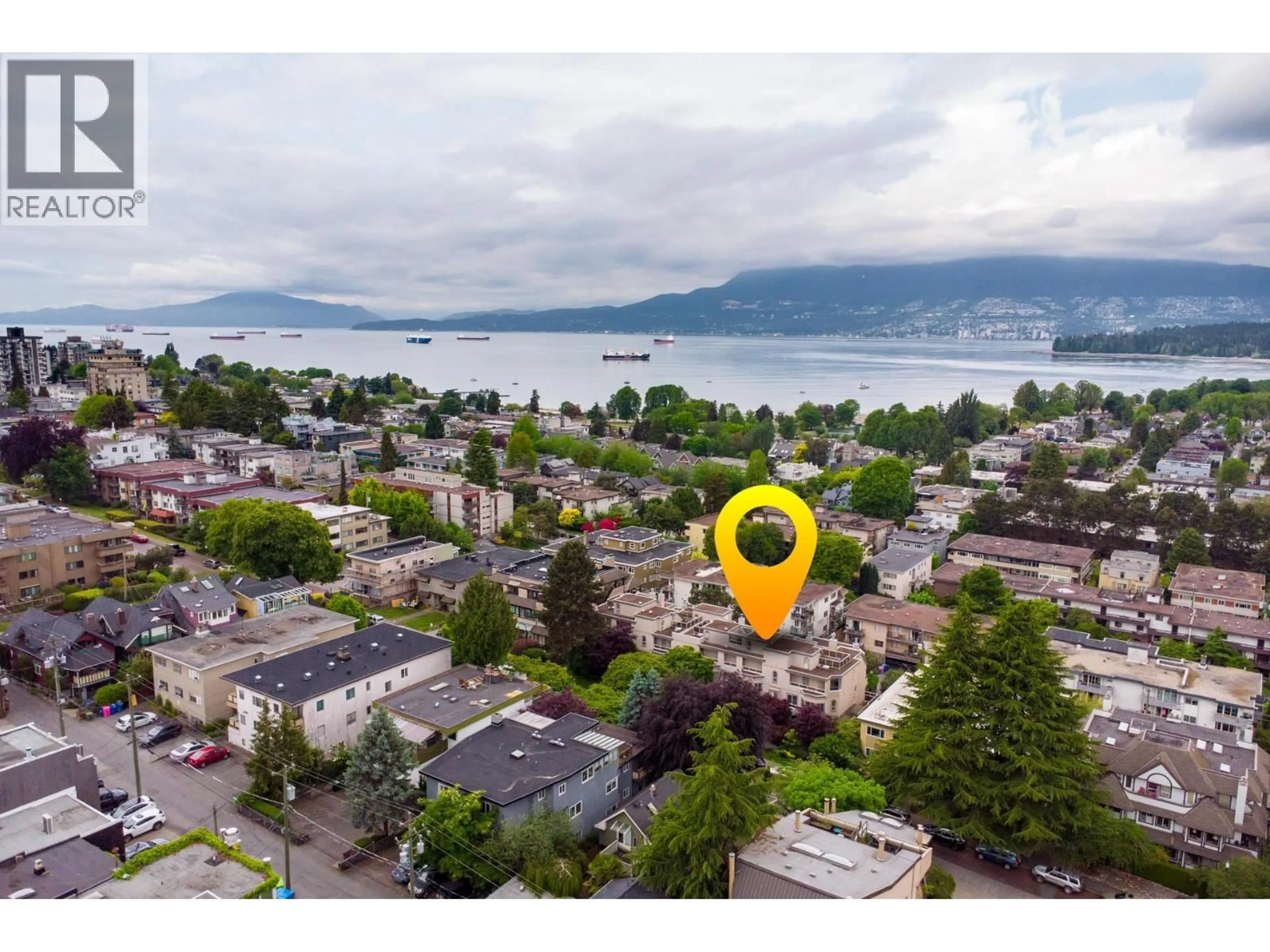 A pic from outside/outdoor area/front of a property/back of a property/a pic from drone, water/lake/river/ocean view for 202 - 2057 3RD AVENUE, Vancouver British Columbia V6J1L4