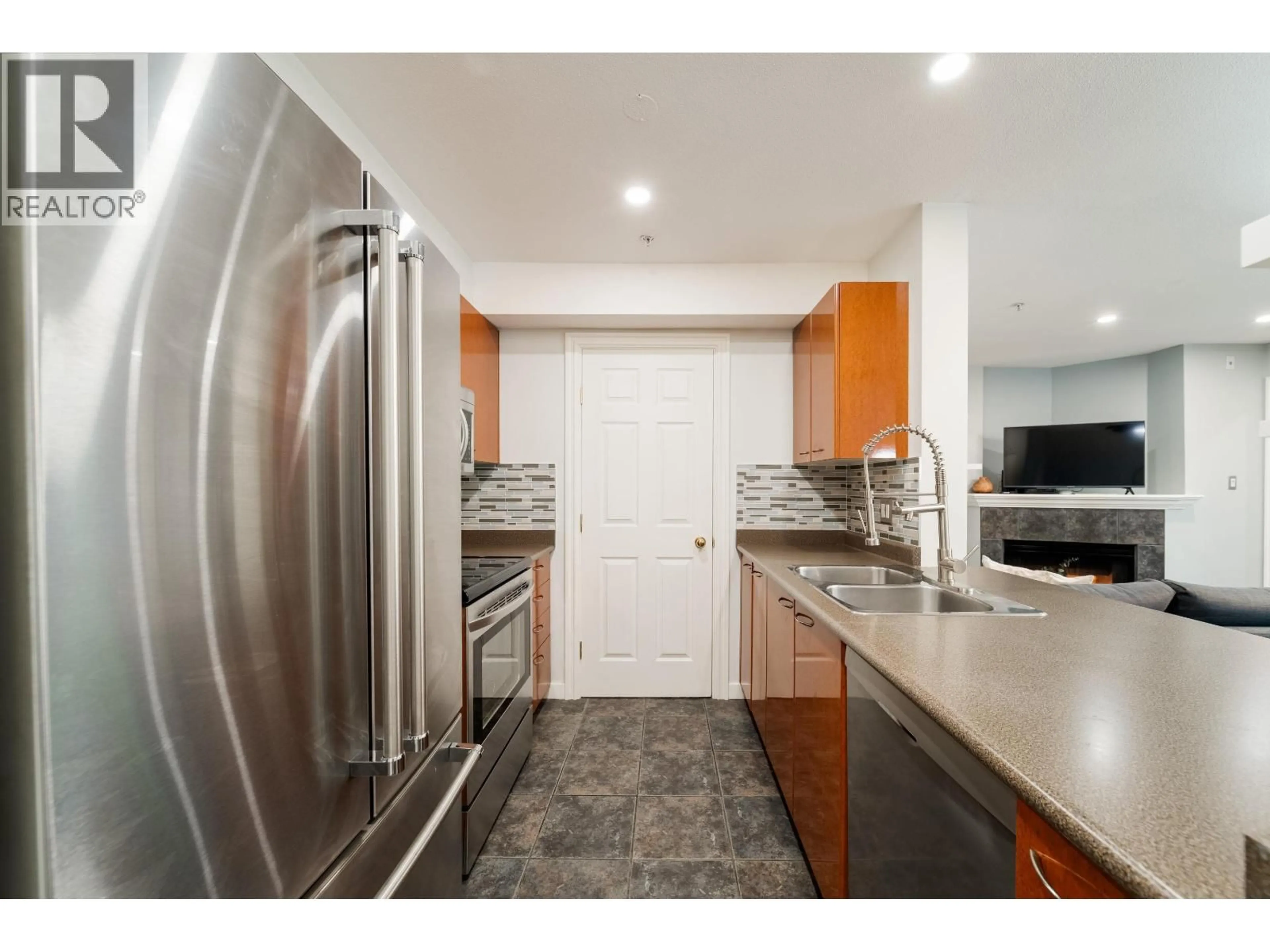 Standard kitchen, ceramic/tile floor for 201 - 1688 8TH AVENUE, Vancouver British Columbia V5N1T5