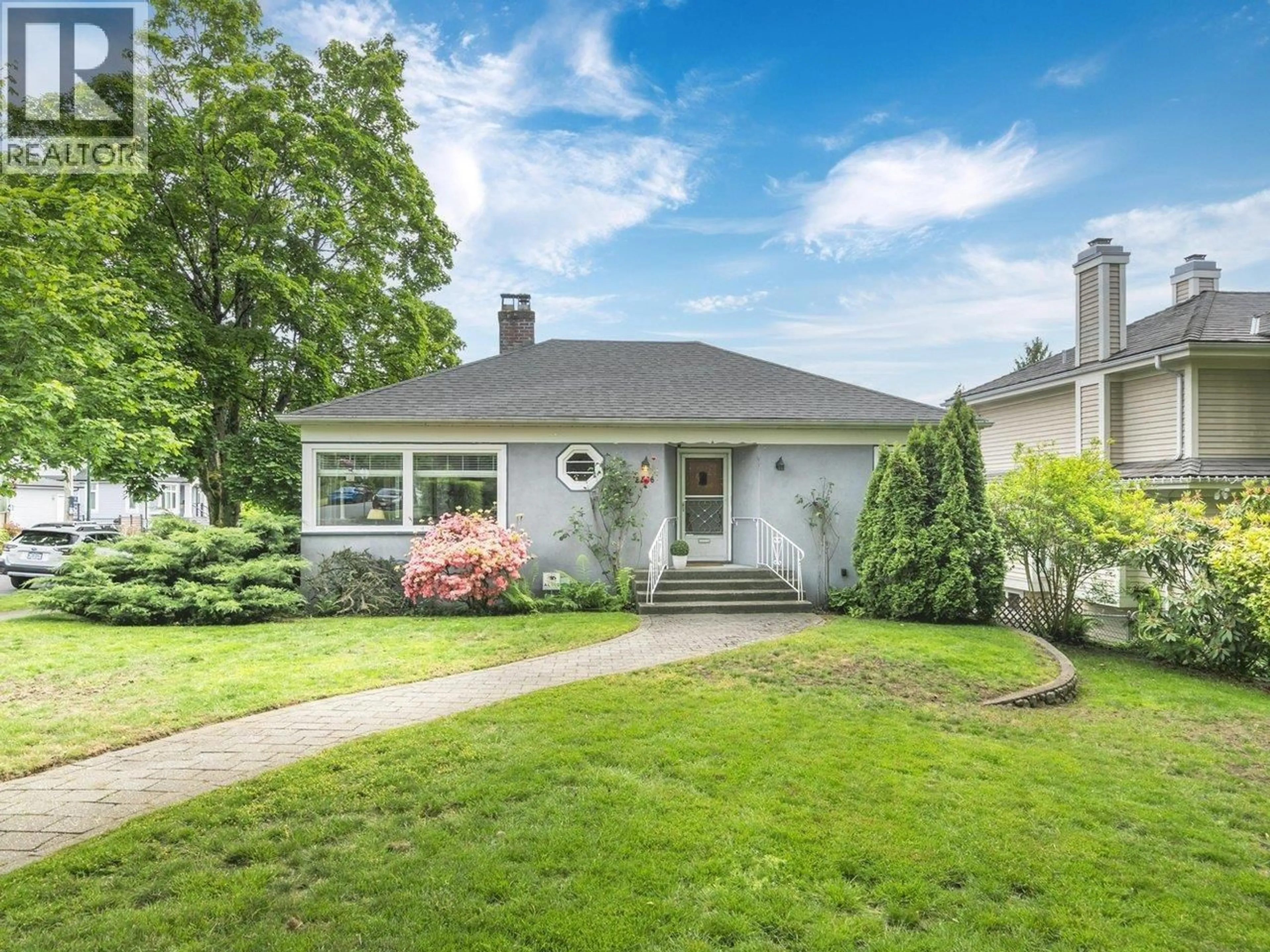 Home with vinyl exterior material, street for 2506 15TH AVENUE, Vancouver British Columbia V6K2Z4