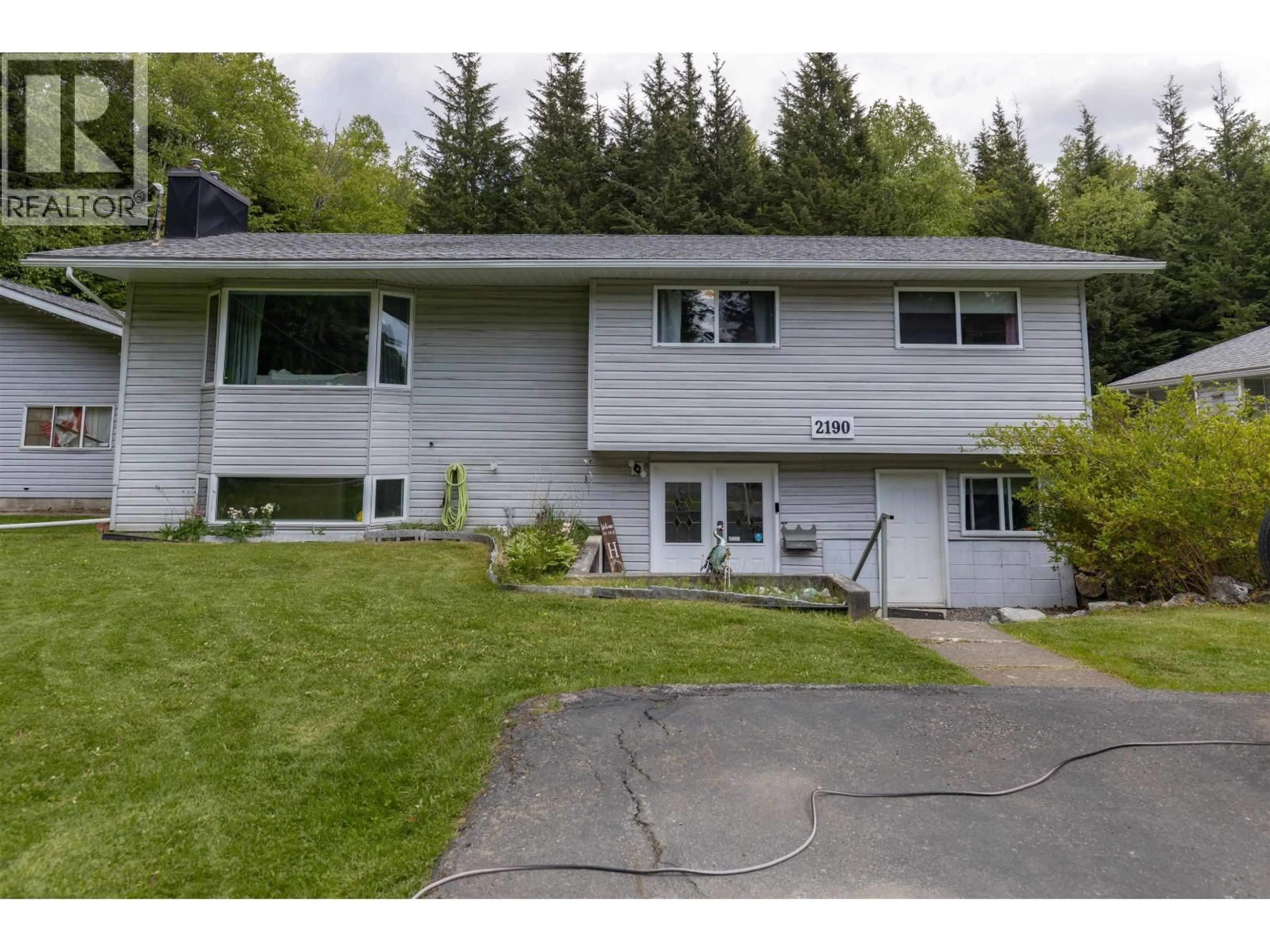 Home with vinyl exterior material, street for 2190 CHURCHILL DRIVE, Thornhill British Columbia V8G0E8
