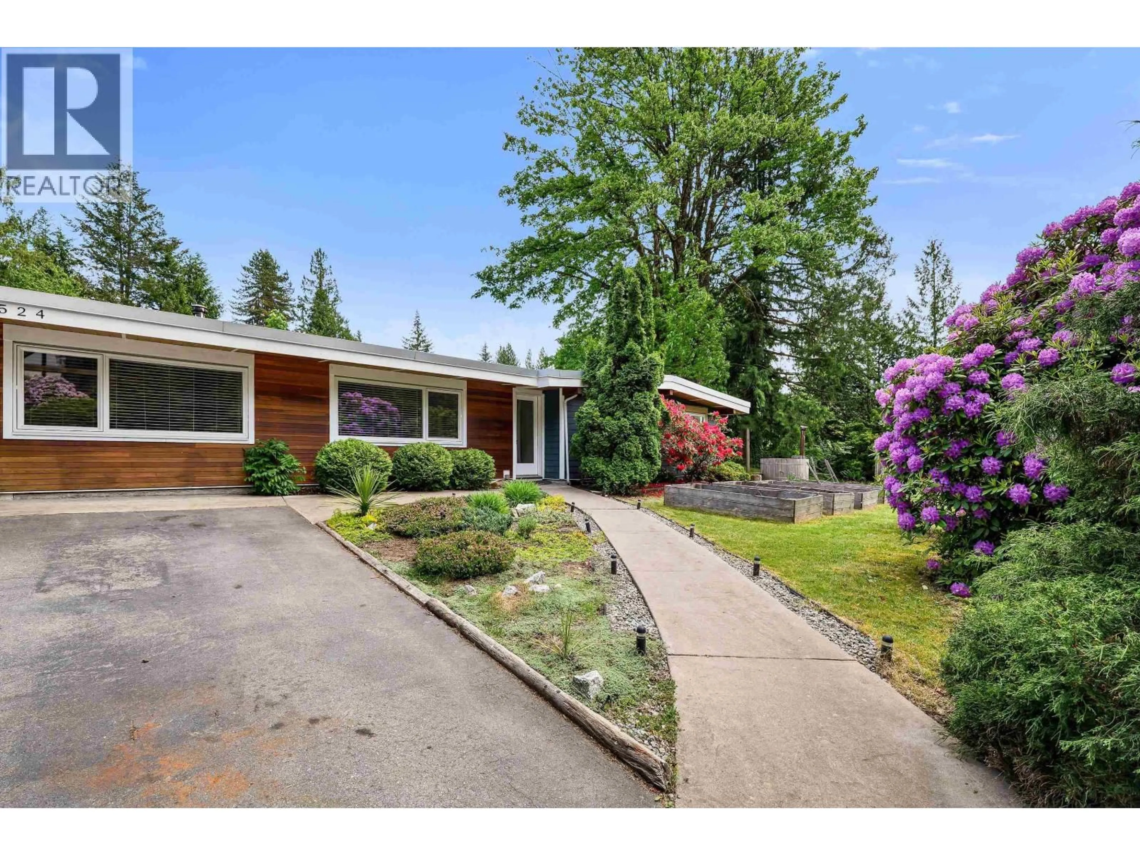 Home with brick exterior material, street for 40524 HIGHLANDS WAY, Squamish British Columbia V0N1T0