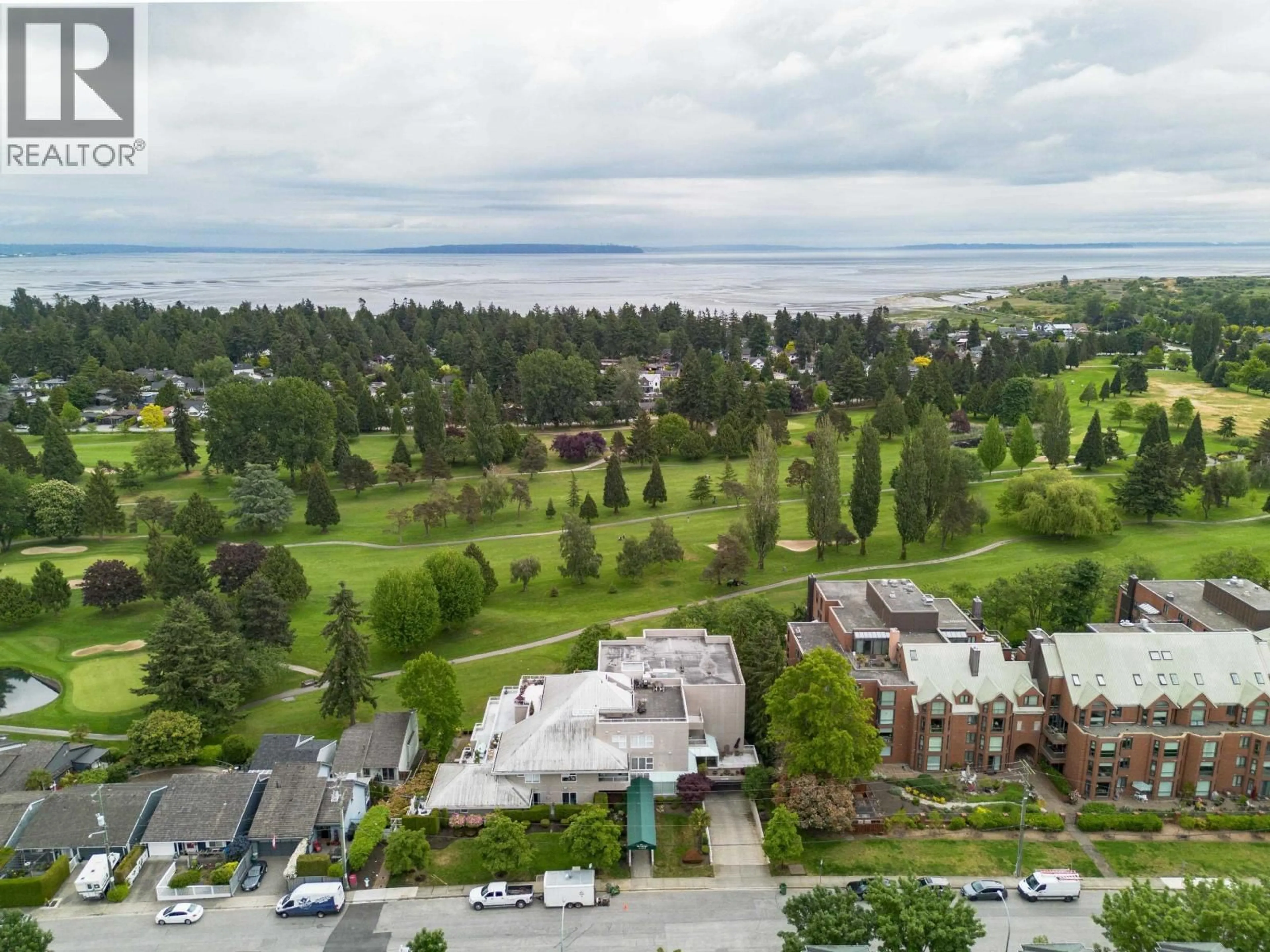 A pic from outside/outdoor area/front of a property/back of a property/a pic from drone, water/lake/river/ocean view for 104 - 1400 VIEW CRESCENT, Tsawwassen British Columbia V4L1Z1