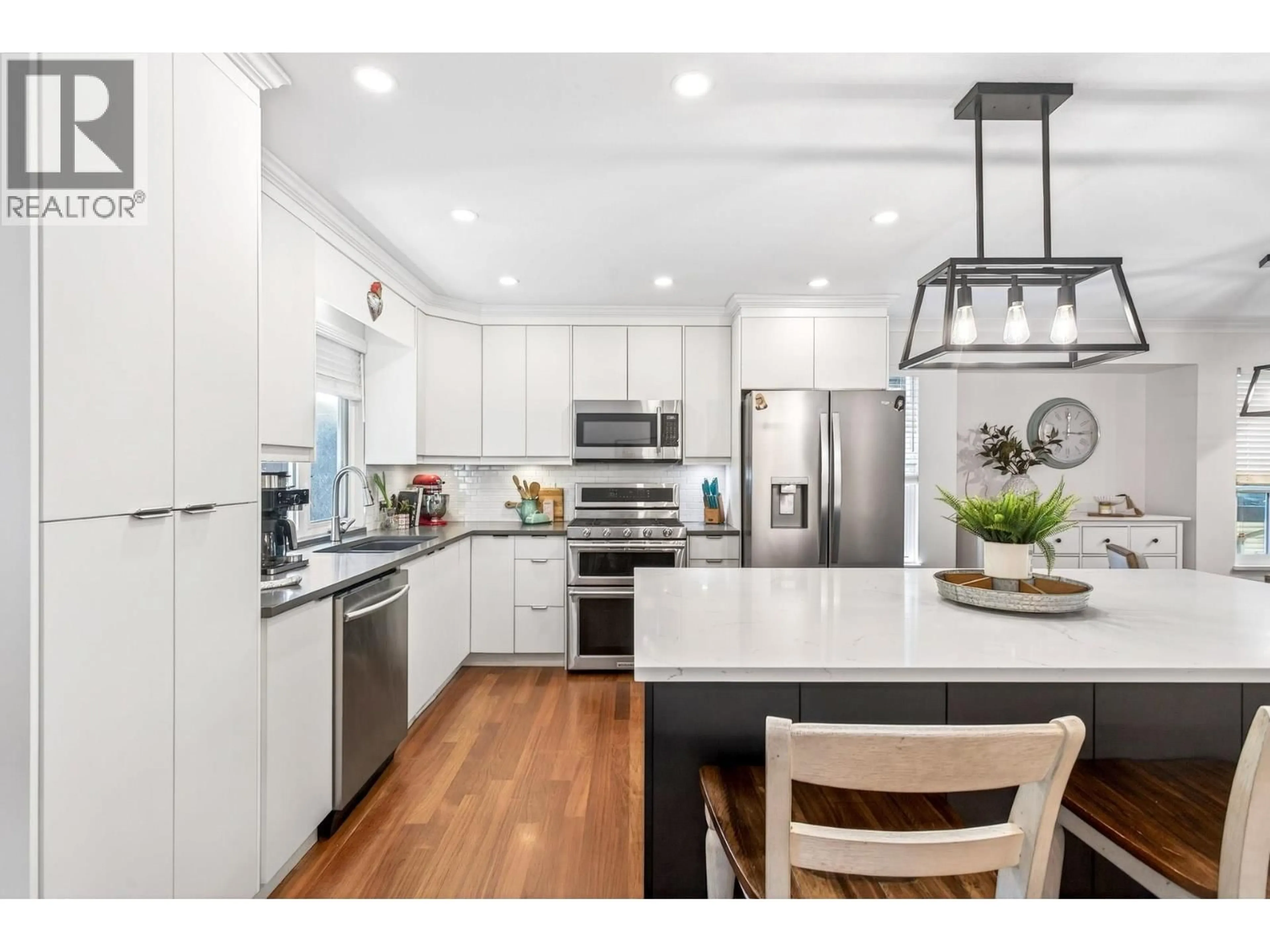 Open concept kitchen, wood/laminate floor for 23594 108 AVENUE, Maple Ridge British Columbia V2W1B1