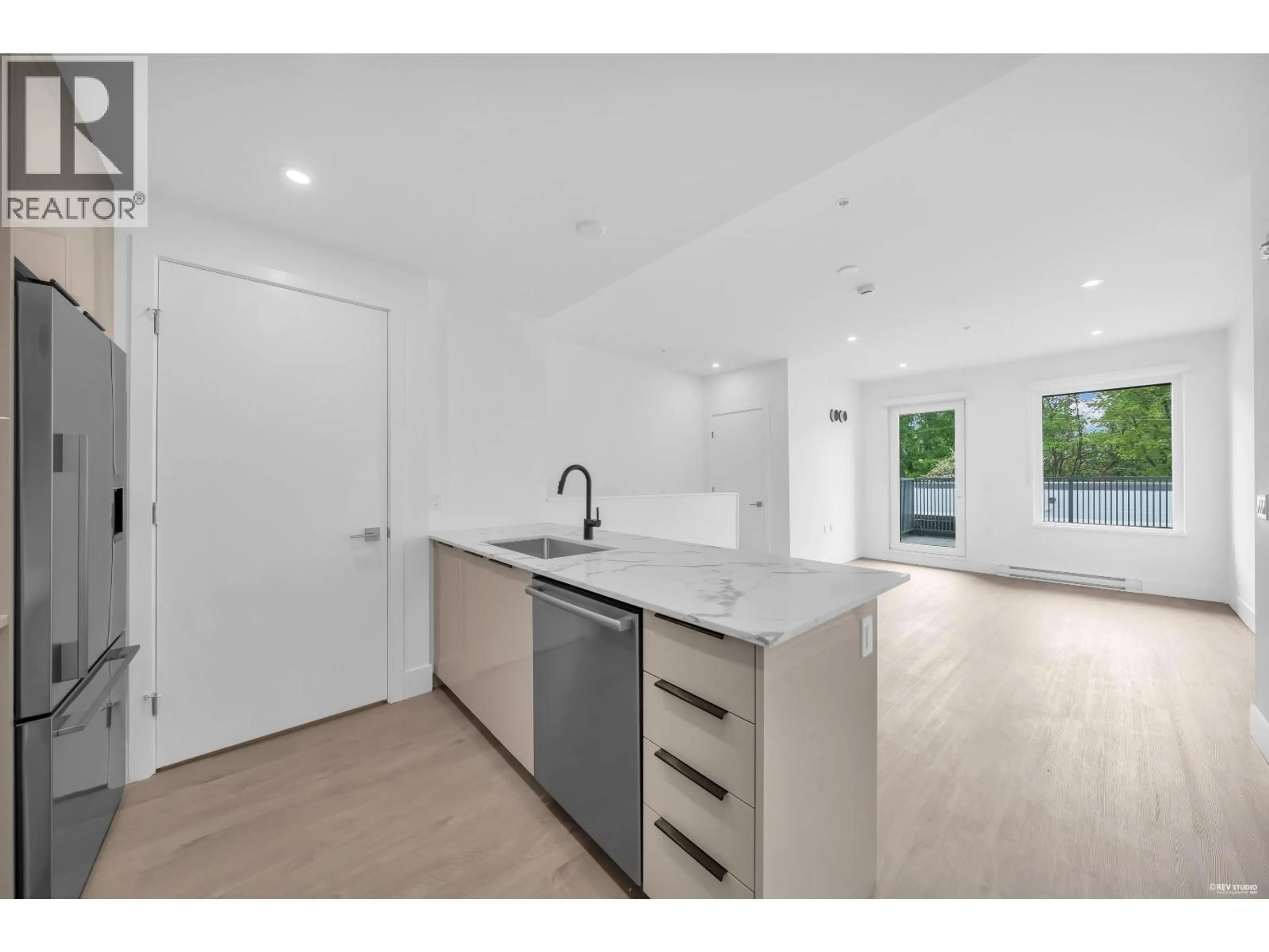 Open concept kitchen, unknown for 315 - 2250 1ST AVENUE, Vancouver British Columbia V5N1B6
