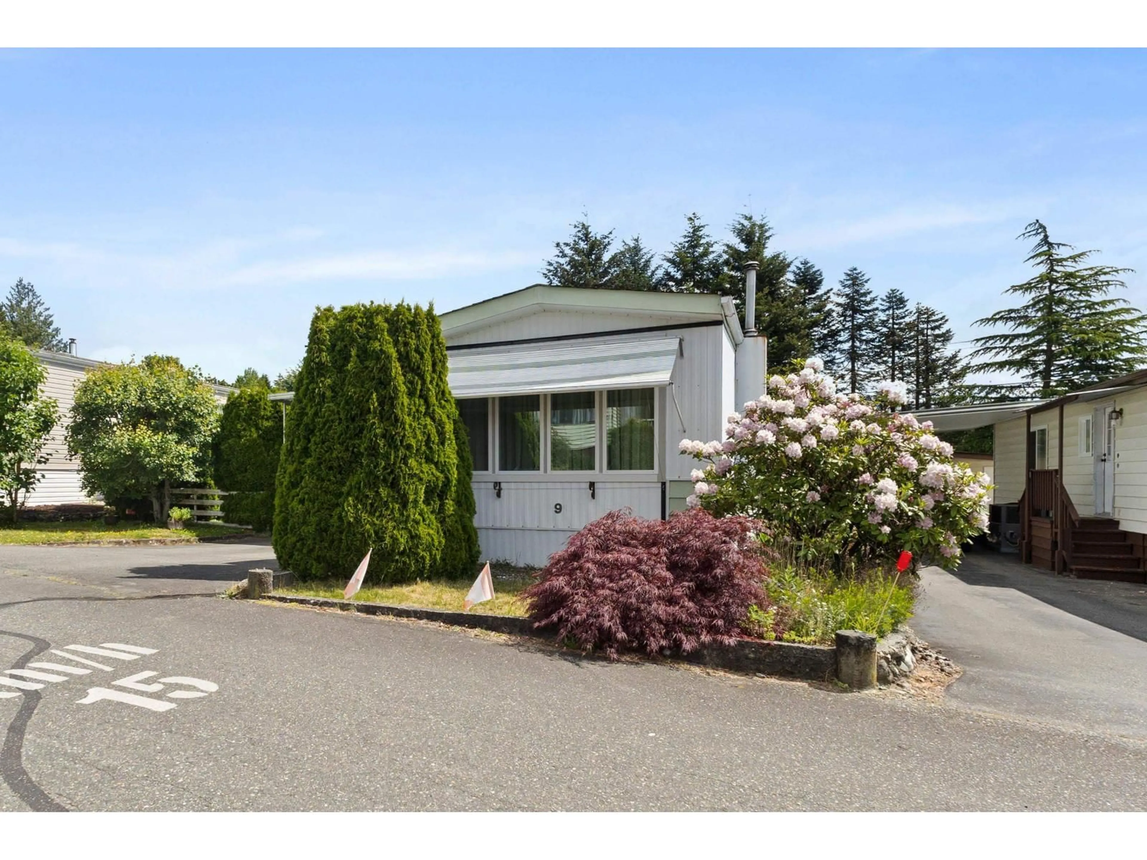 Home with vinyl exterior material, street for 9 - 27111 0 AVENUE, Langley British Columbia V4W2S9