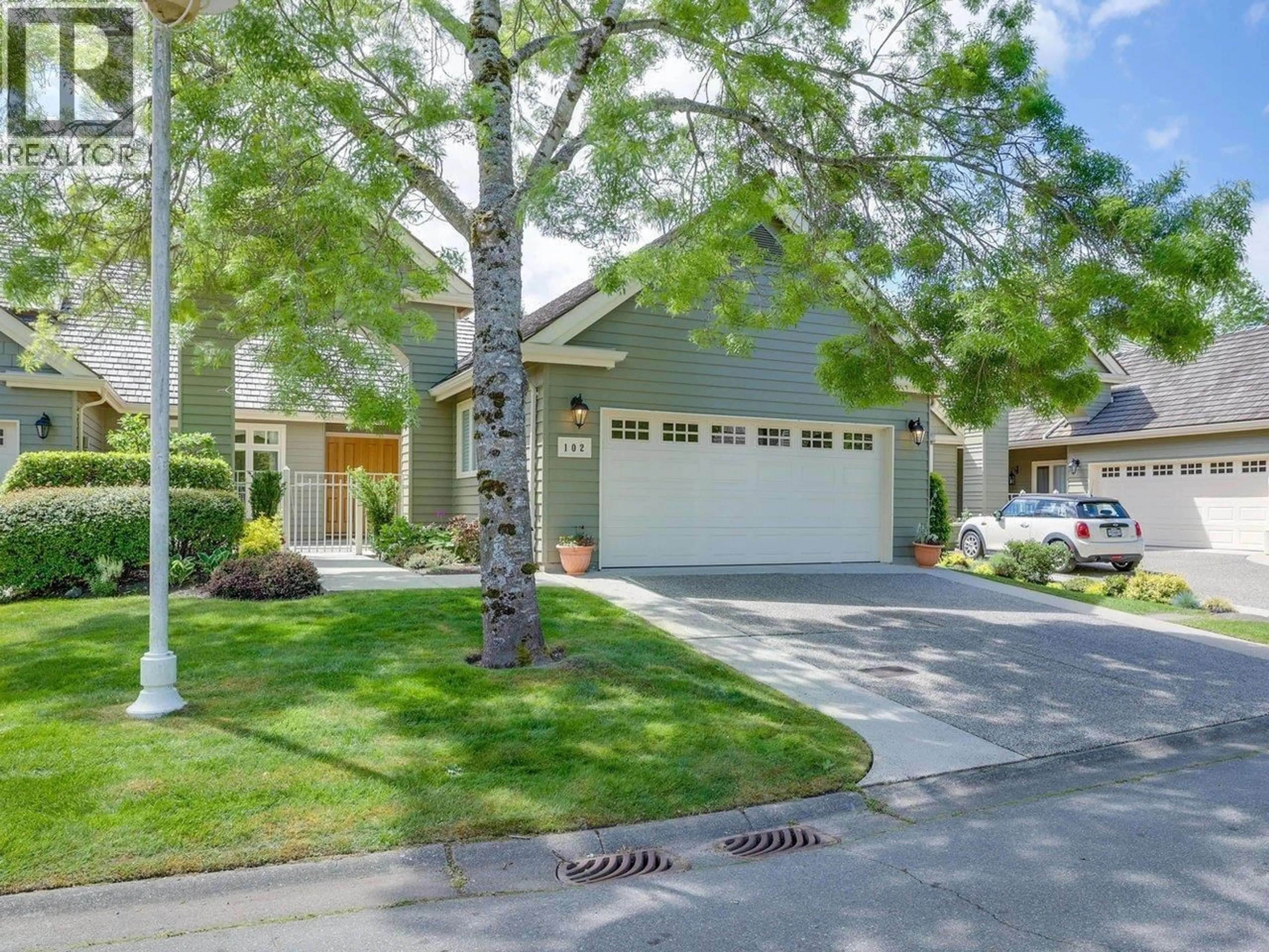 Home with vinyl exterior material, street for 102 - 6505 3 AVENUE, Delta British Columbia V4L2N1