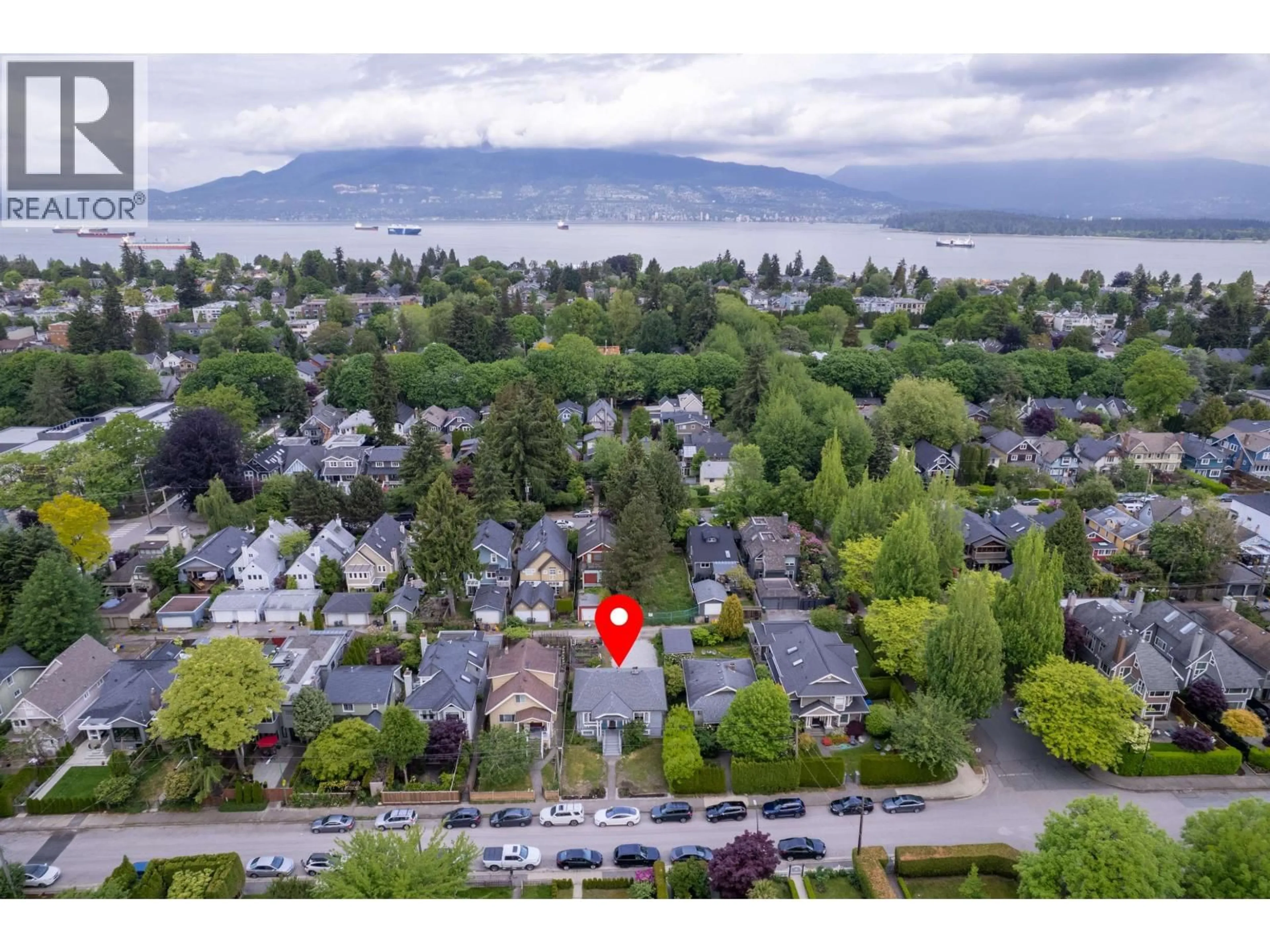 A pic from outside/outdoor area/front of a property/back of a property/a pic from drone, water/lake/river/ocean view for 3425 8TH AVENUE, Vancouver British Columbia V6R1Y6