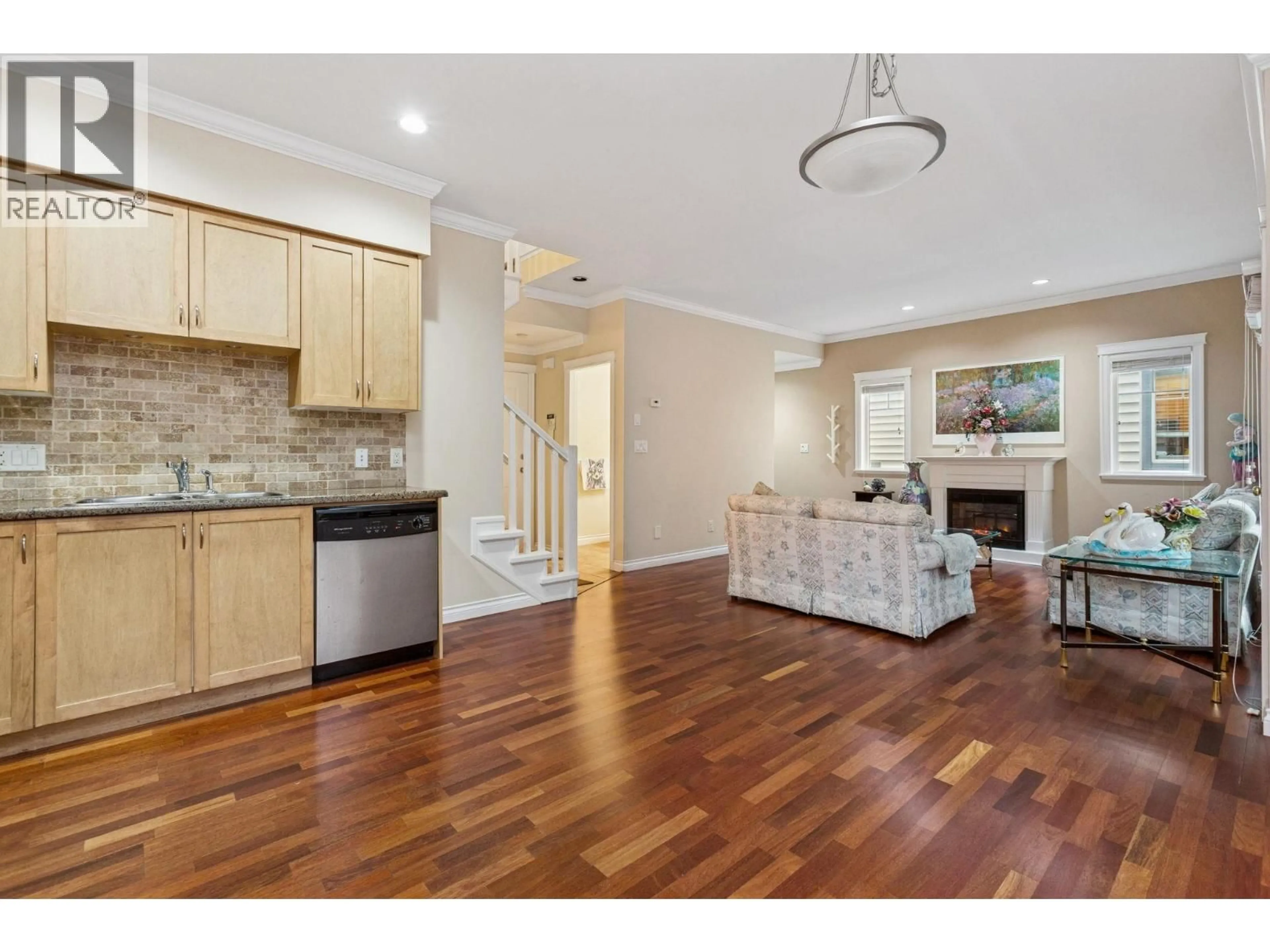 Open concept kitchen, wood/laminate floor for 19 - 7331 NO. 4 ROAD, Richmond British Columbia V6Y2T4