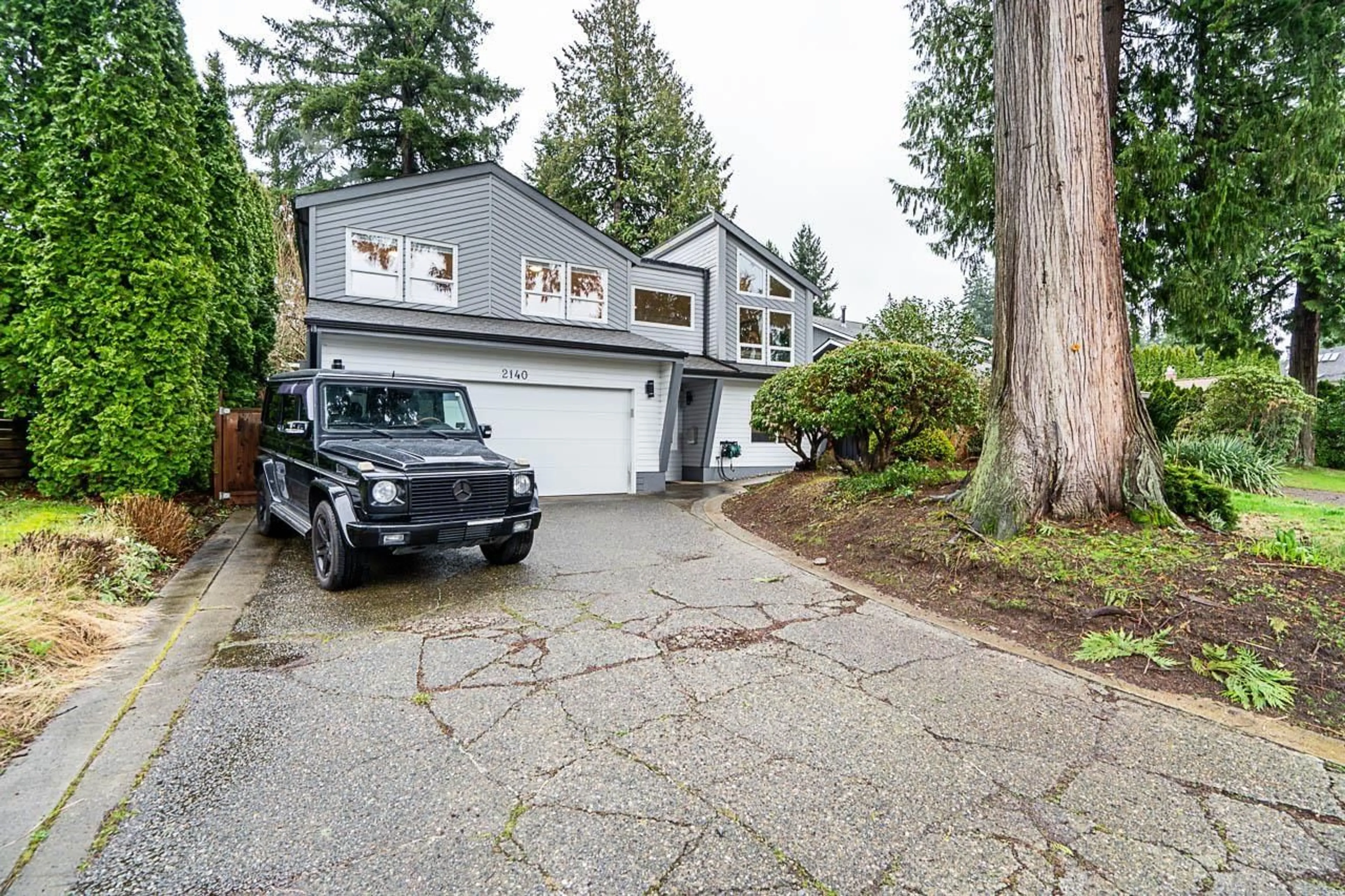Home with vinyl exterior material, street for 2140 127A STREET, Surrey British Columbia V4A3S9