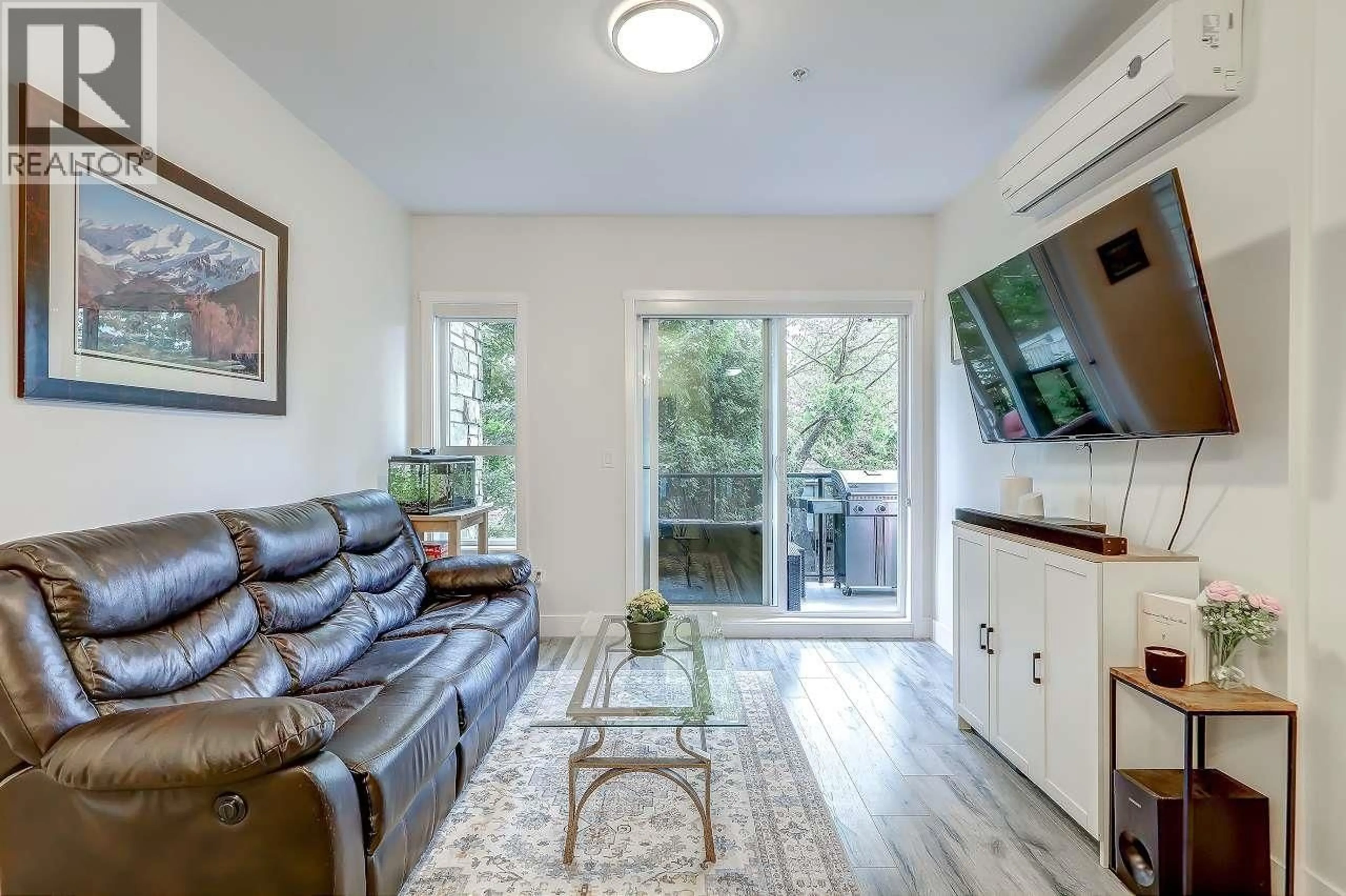 Living room with furniture, wood/laminate floor for 206 - 12310 222 STREET, Maple Ridge British Columbia V2X5W7