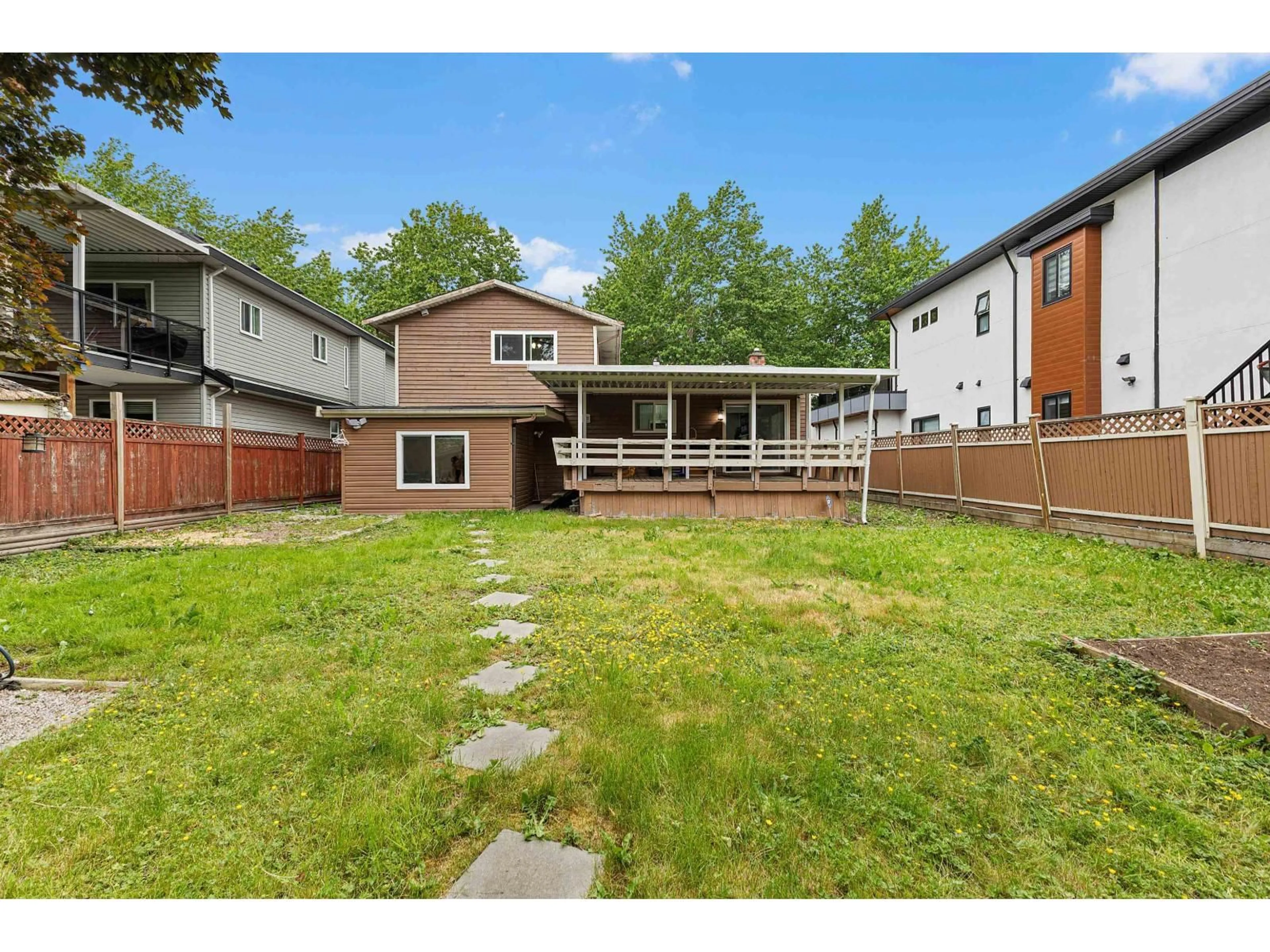 A pic from outside/outdoor area/front of a property/back of a property/a pic from drone, street for 14518 85A AVENUE, Surrey British Columbia V3S5T6