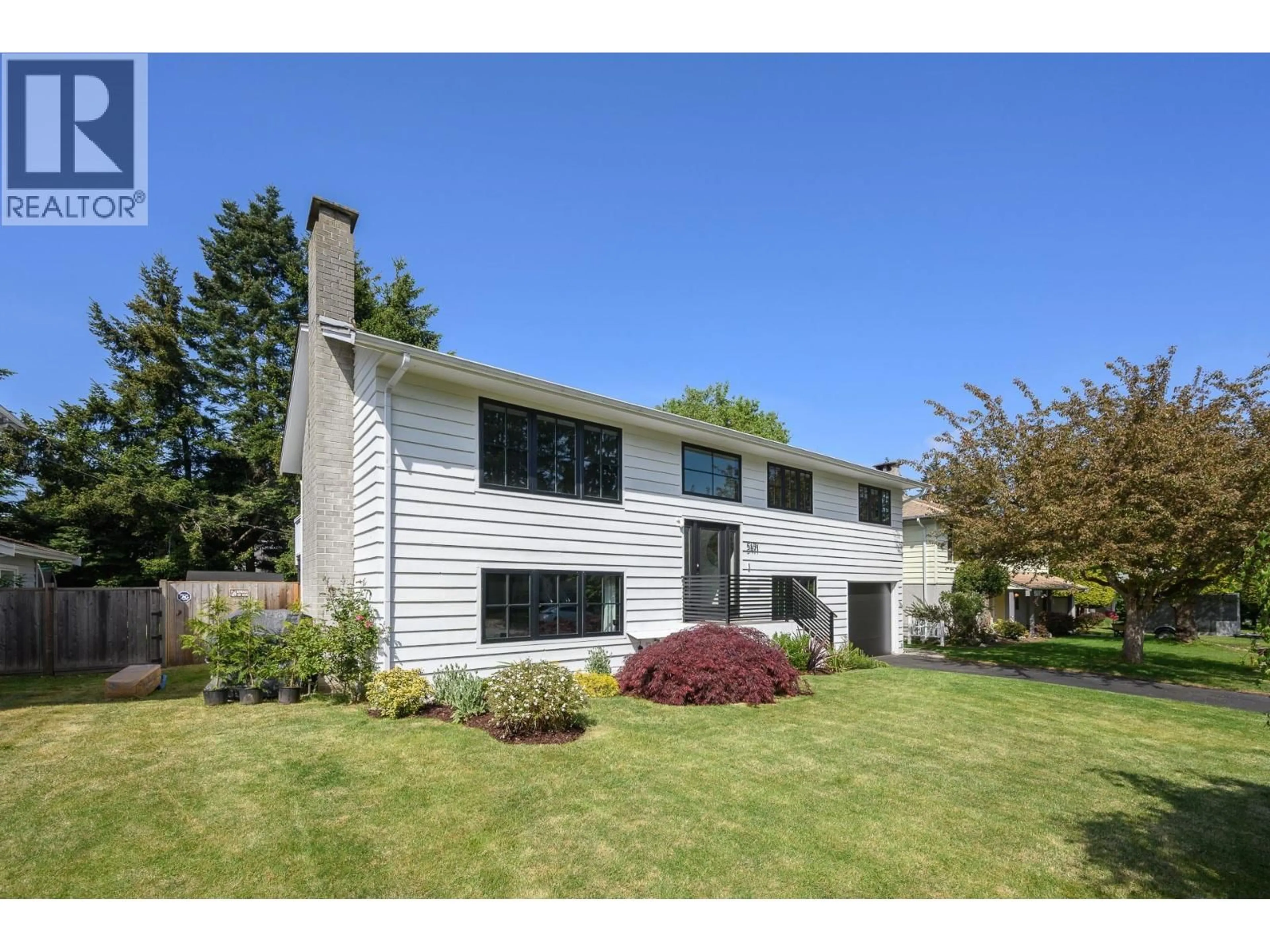 Home with vinyl exterior material, street for 5471 7B AVENUE, Delta British Columbia V4M1S7