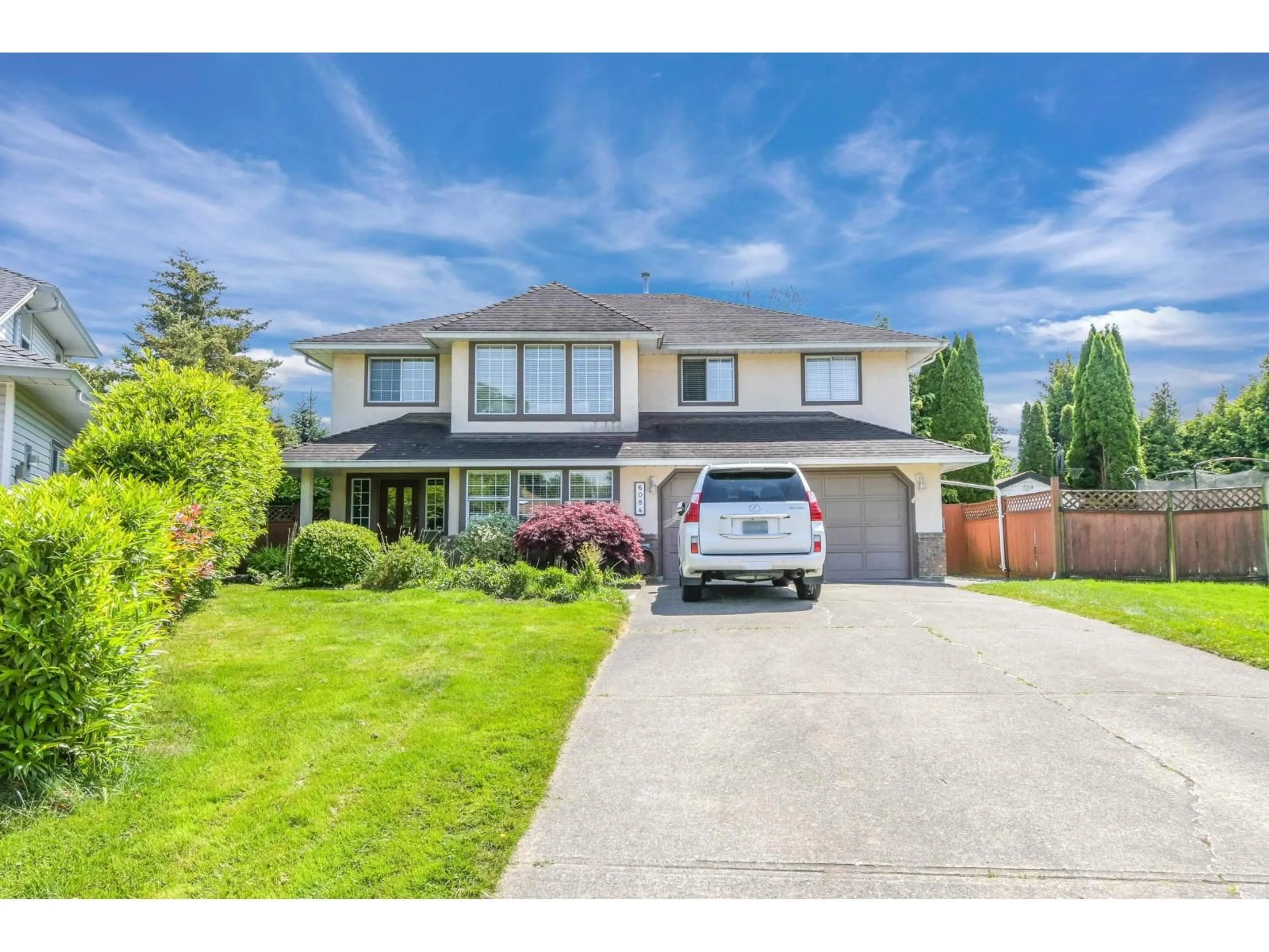 Home with vinyl exterior material, street for 6084 185 STREET, Surrey British Columbia V3S7P7
