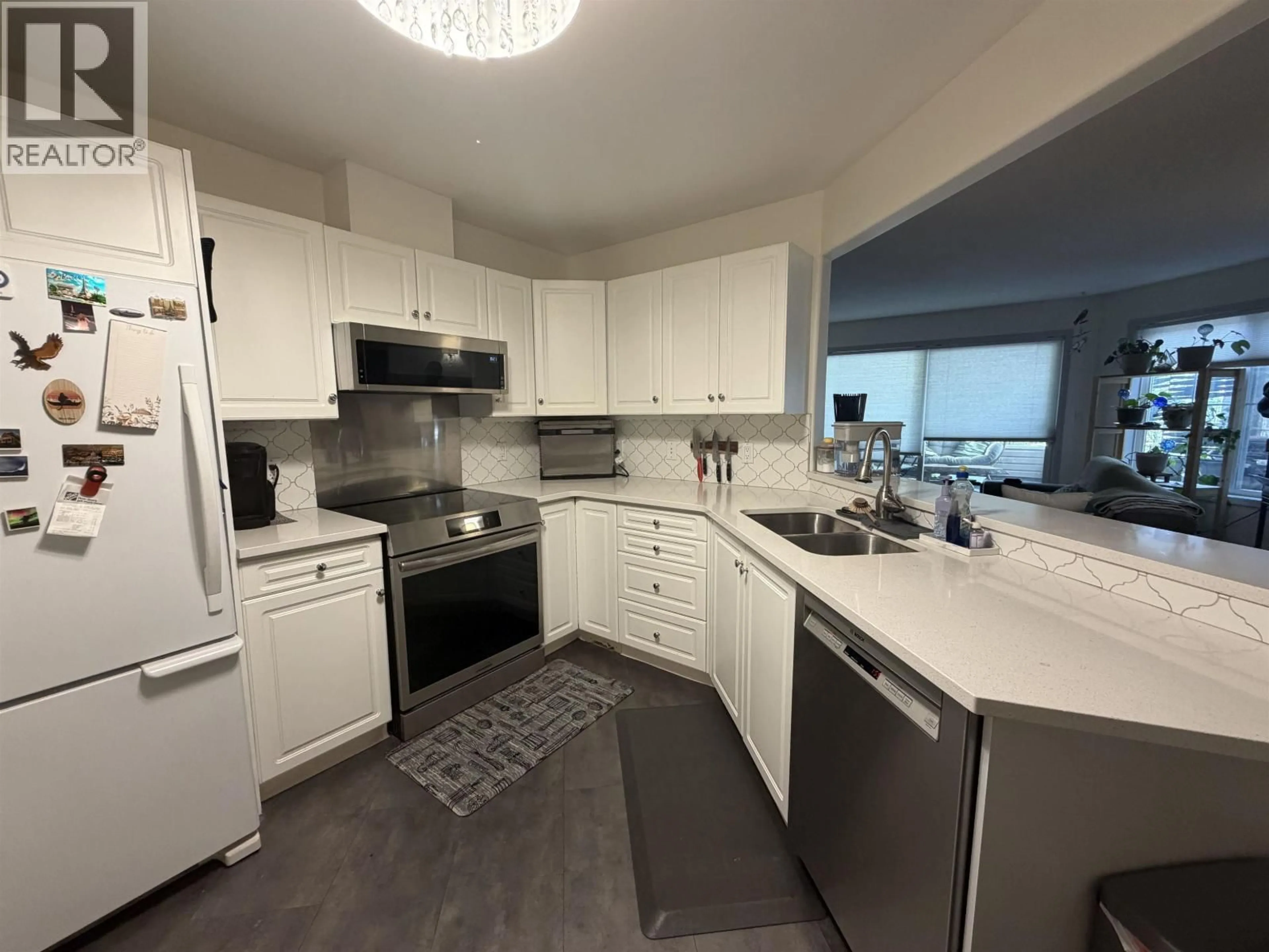 Open concept kitchen, unknown for 101 - 2055 INGLEDEW STREET, Prince George British Columbia V2L5S1