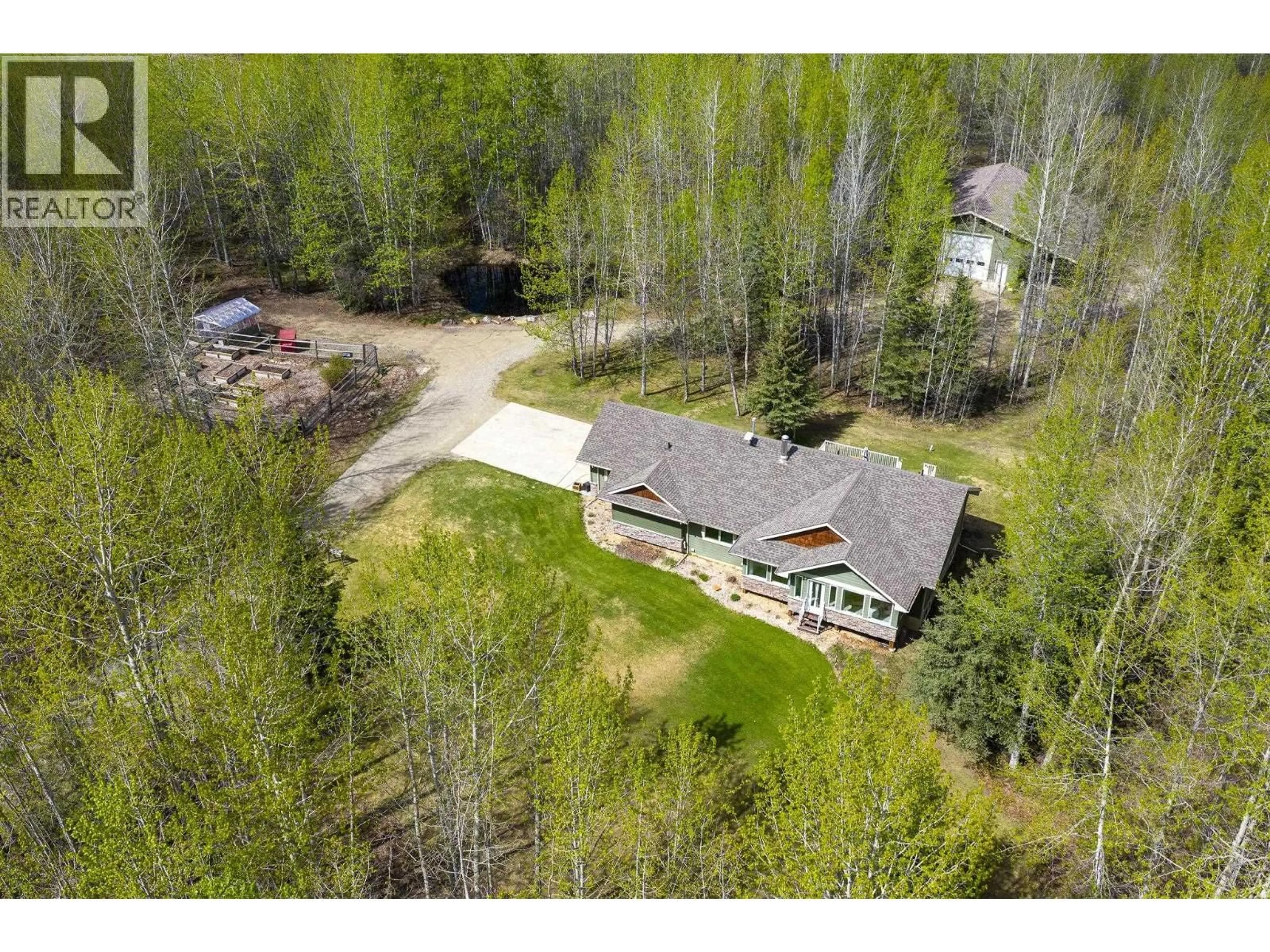 A pic from outside/outdoor area/front of a property/back of a property/a pic from drone, unknown for 13244 KOOP ROAD, Fort St. John British Columbia V1J8K7