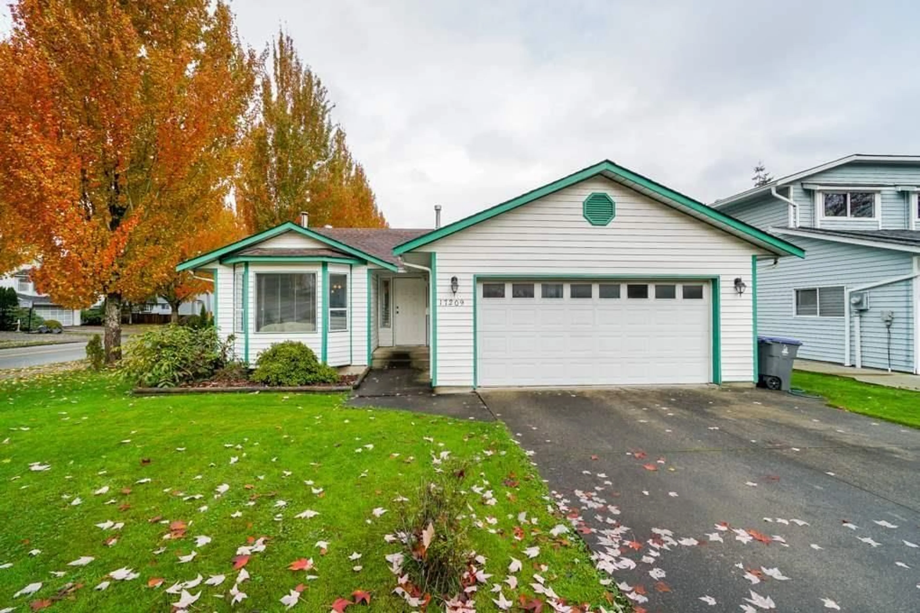 Home with vinyl exterior material, street for 17209 62A AVE, Surrey British Columbia V3S6V6
