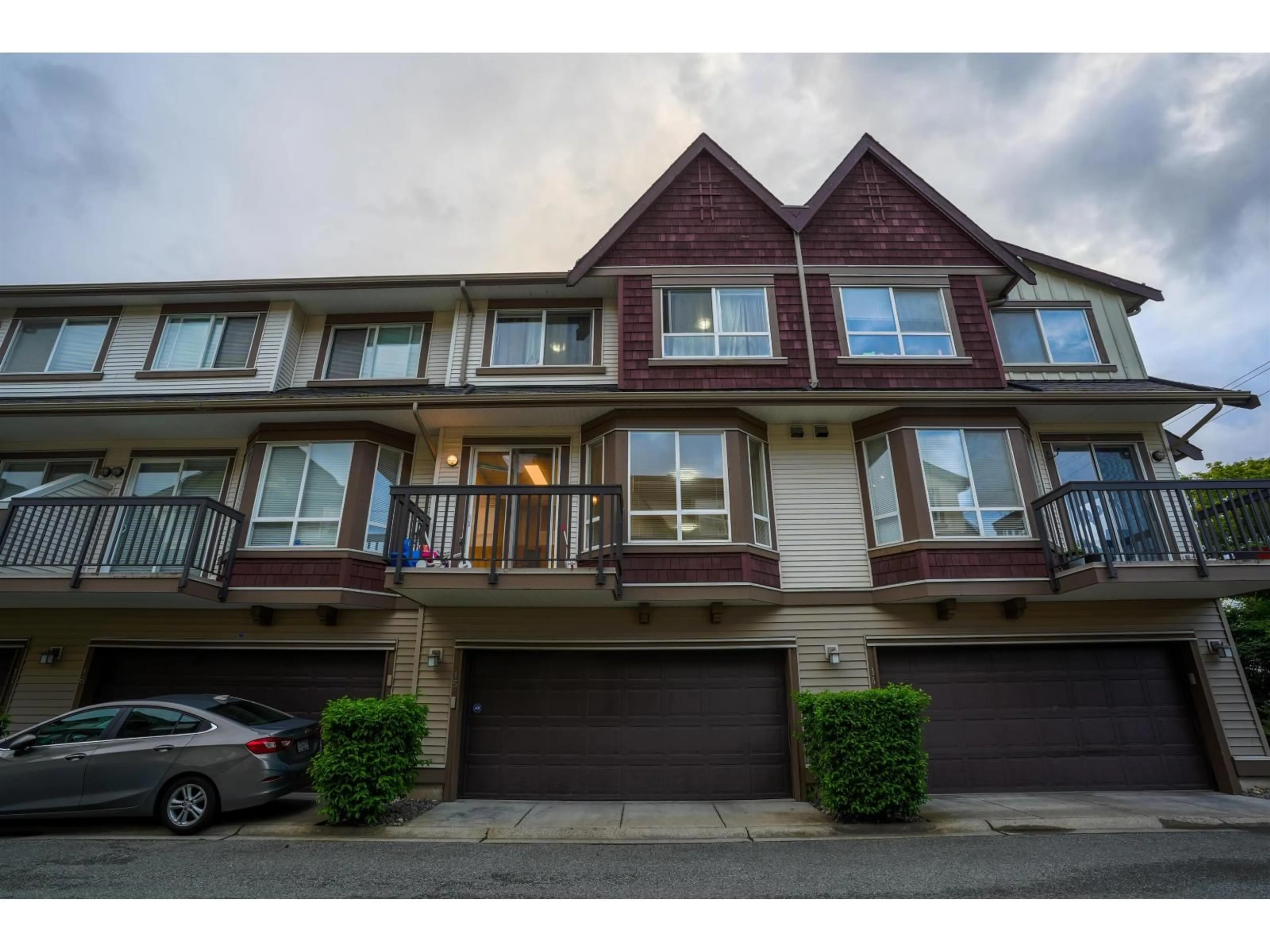 A pic from outside/outdoor area/front of a property/back of a property/a pic from drone, street for 15 - 7155 189 STREET, Surrey British Columbia V4N5S8