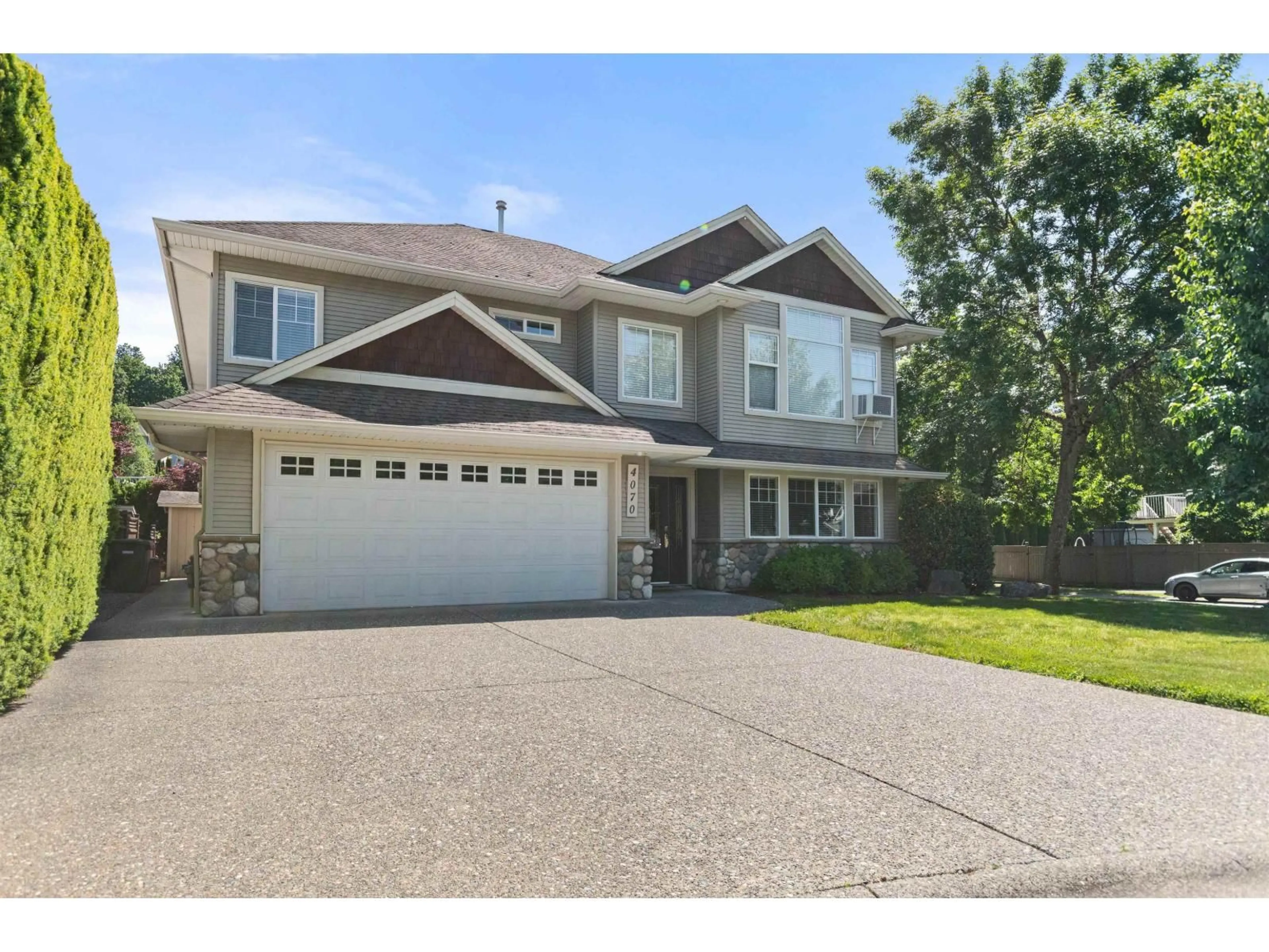 Home with vinyl exterior material, street for 4070 CHANNEL STREET, Abbotsford British Columbia V3G3A6
