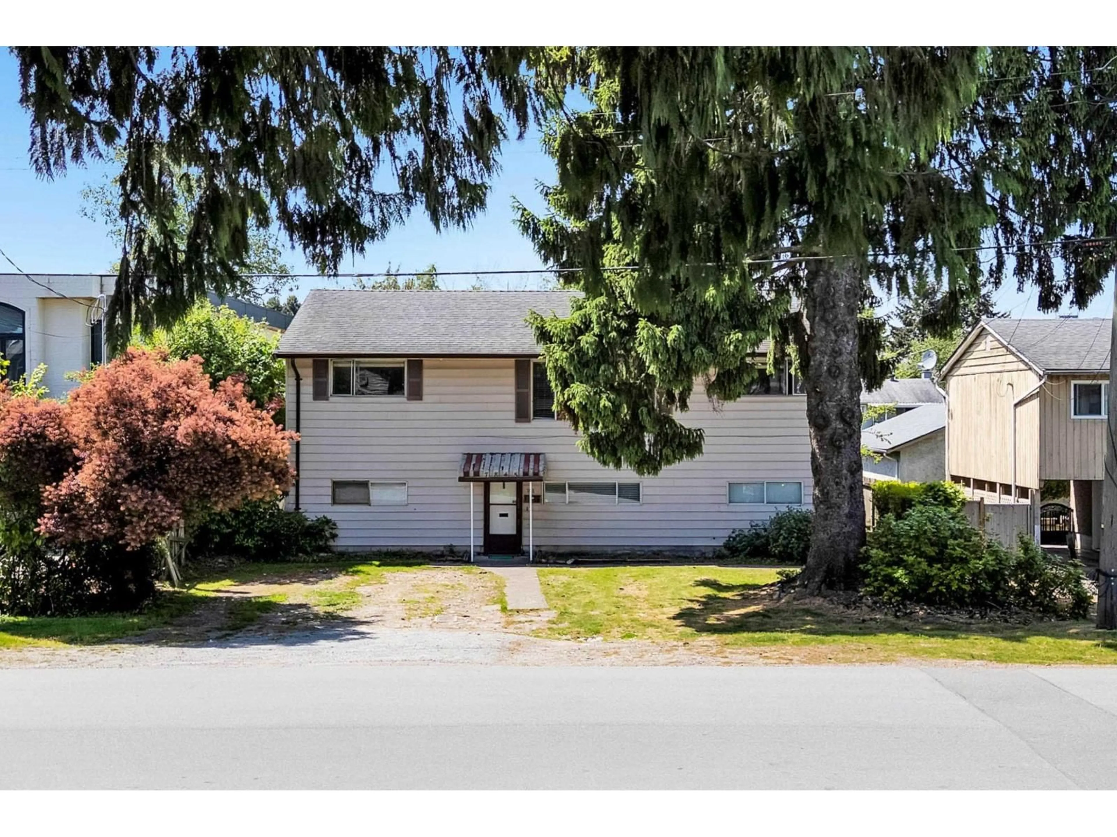 Home with vinyl exterior material, street for 7845 122A STREET, Surrey British Columbia V3W3T4
