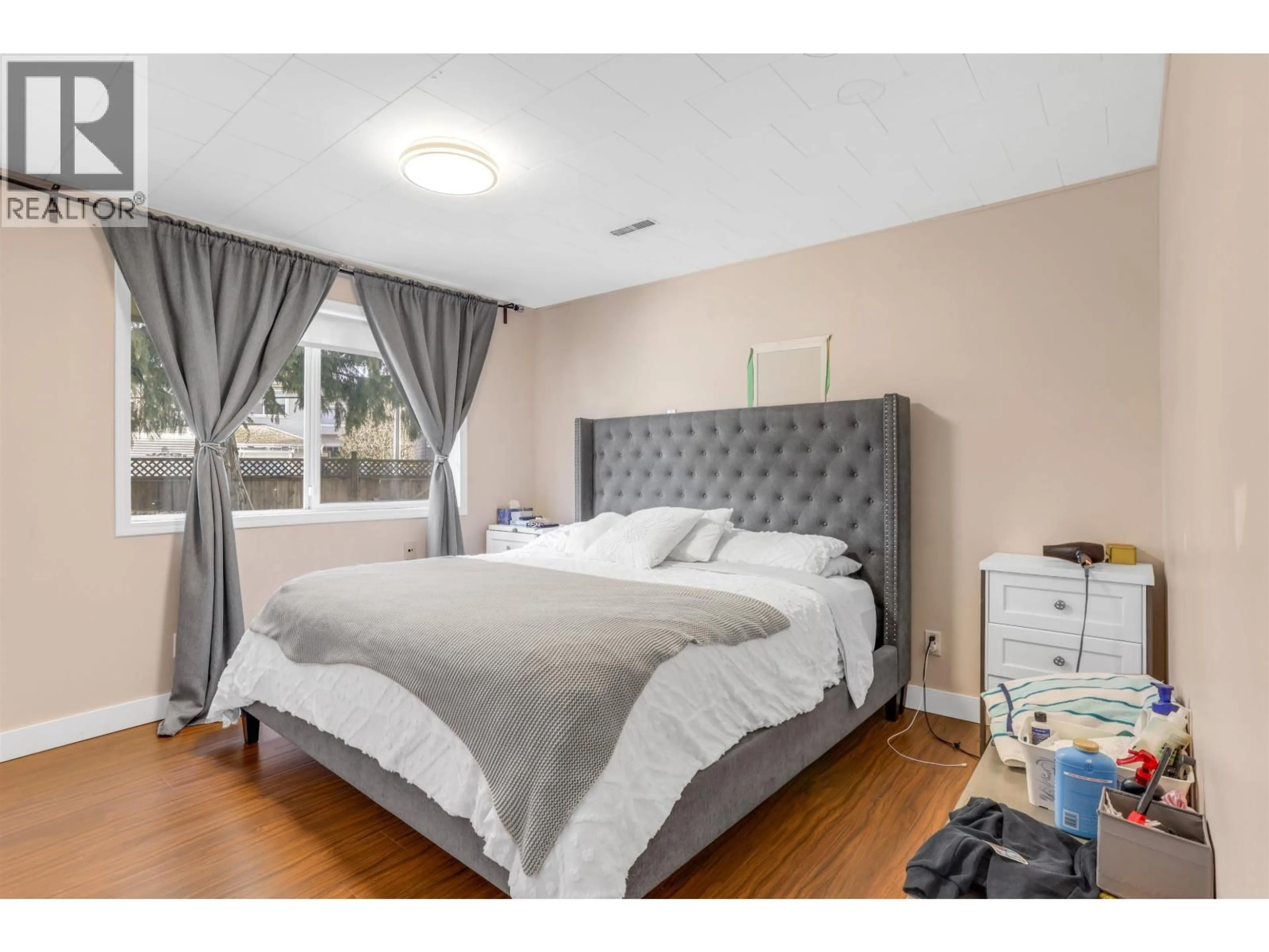 Bedroom with bed, wood/laminate floor for 9660 BATES ROAD, Richmond British Columbia V7A1E4