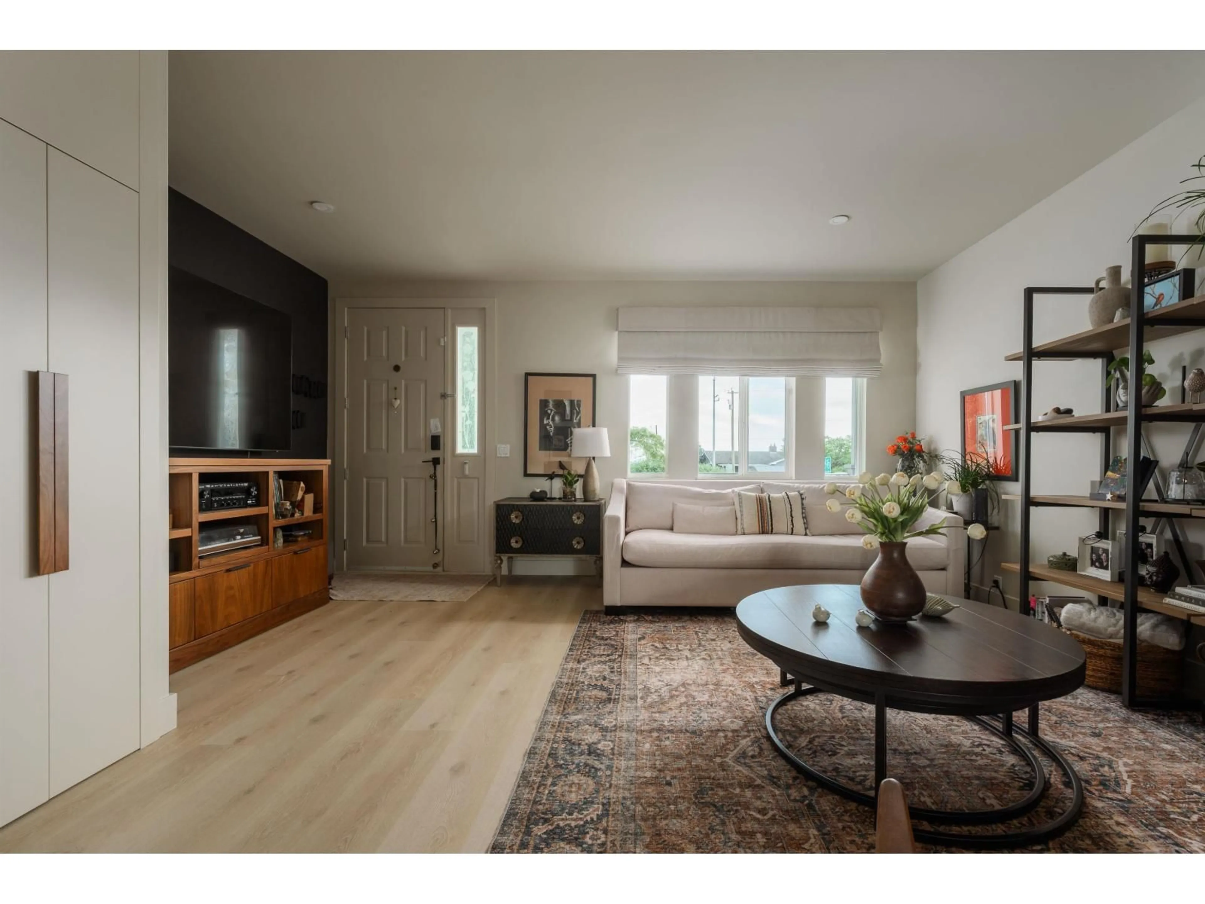 Living room with furniture, wood/laminate floor for 107 - 33751 7TH AVENUE, Mission British Columbia V2V7C2