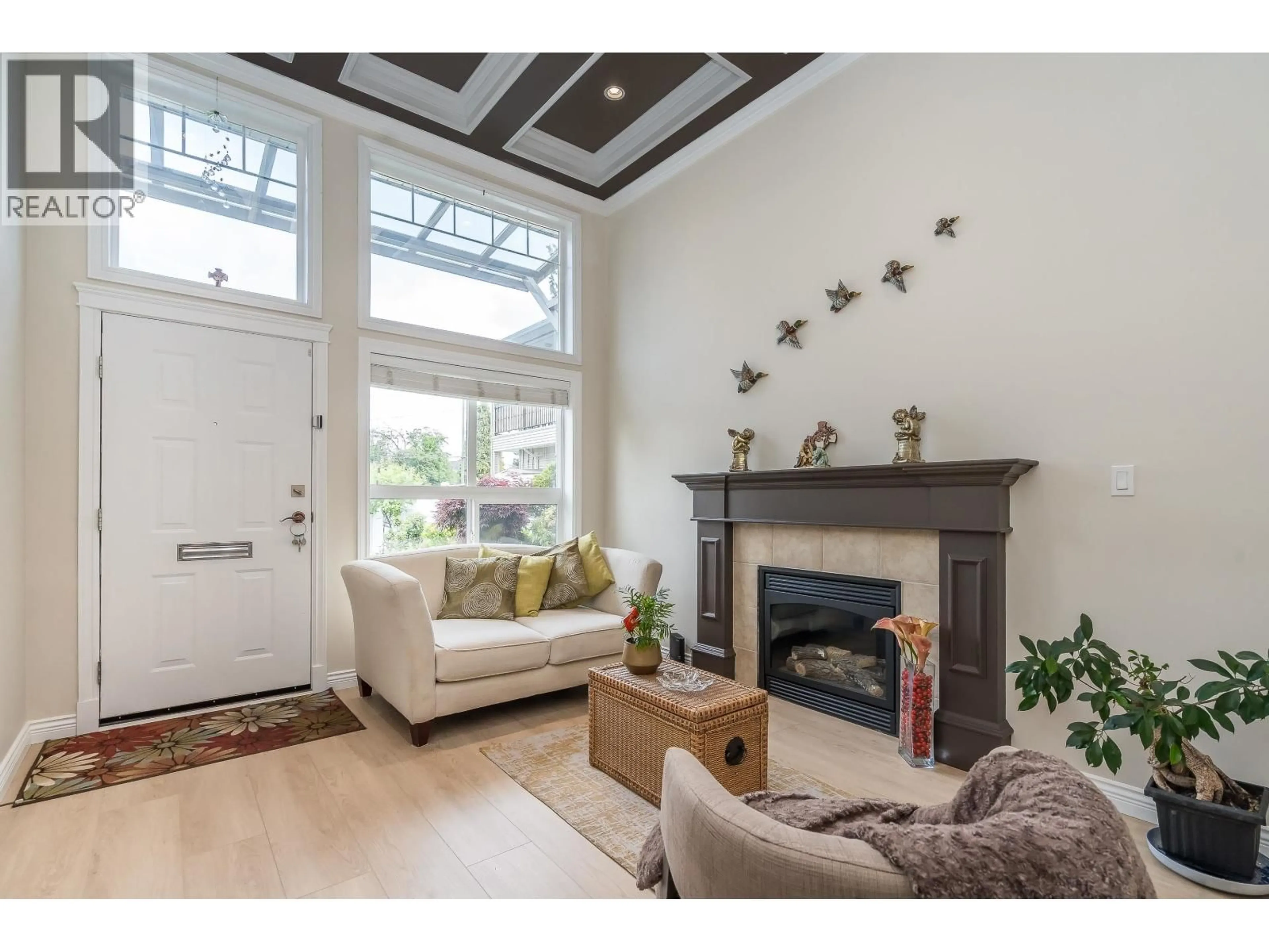 Living room with furniture, wood/laminate floor for 6459 WALKER AVENUE, Burnaby British Columbia V5E3B7