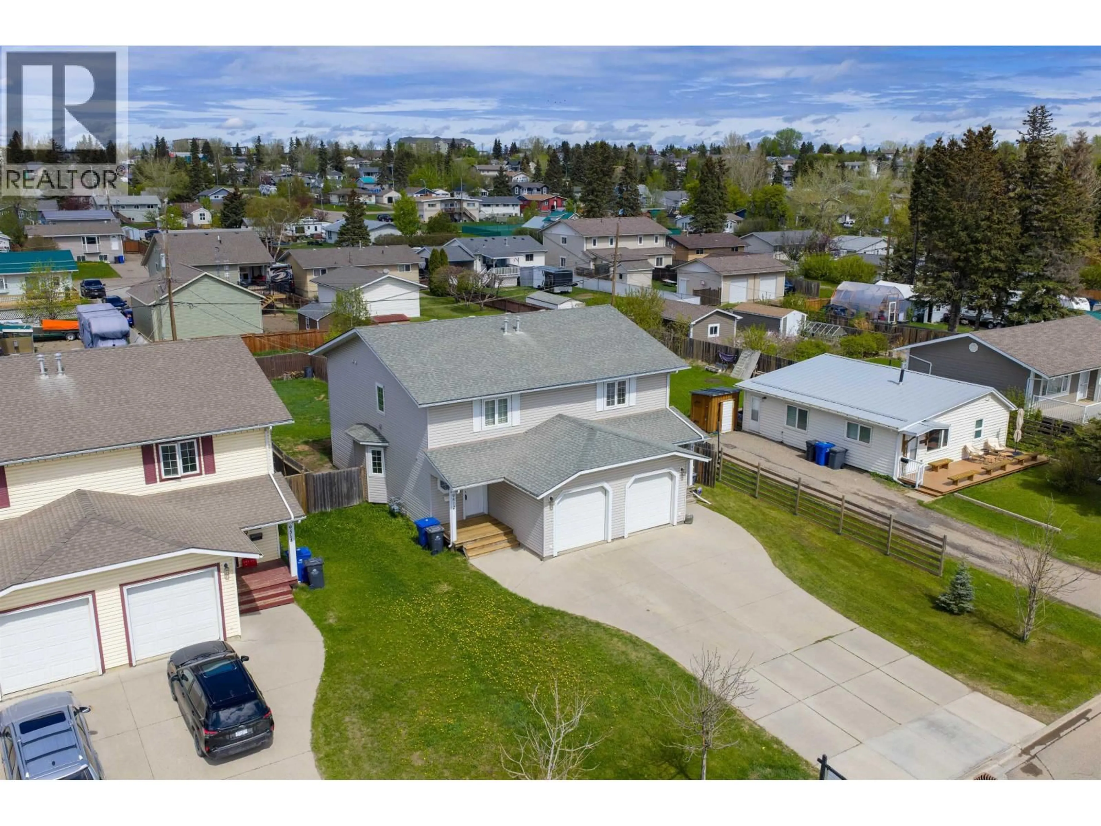 A pic from outside/outdoor area/front of a property/back of a property/a pic from drone, street for 9512 94 AVENUE, Fort St. John British Columbia V1J1G3