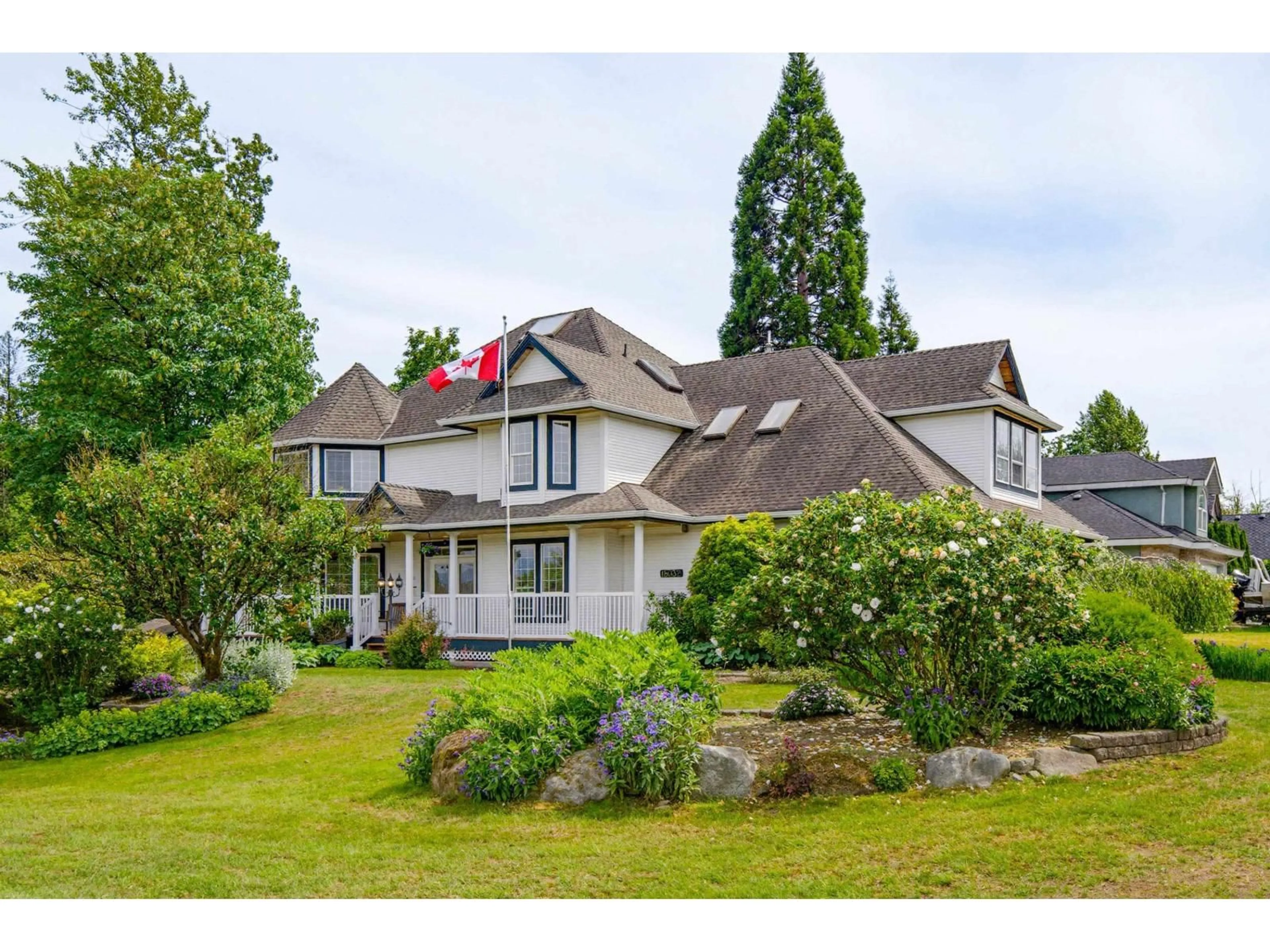 A pic from outside/outdoor area/front of a property/back of a property/a pic from drone, mountain view for 18032 98 AVENUE, Surrey British Columbia V4N4V9