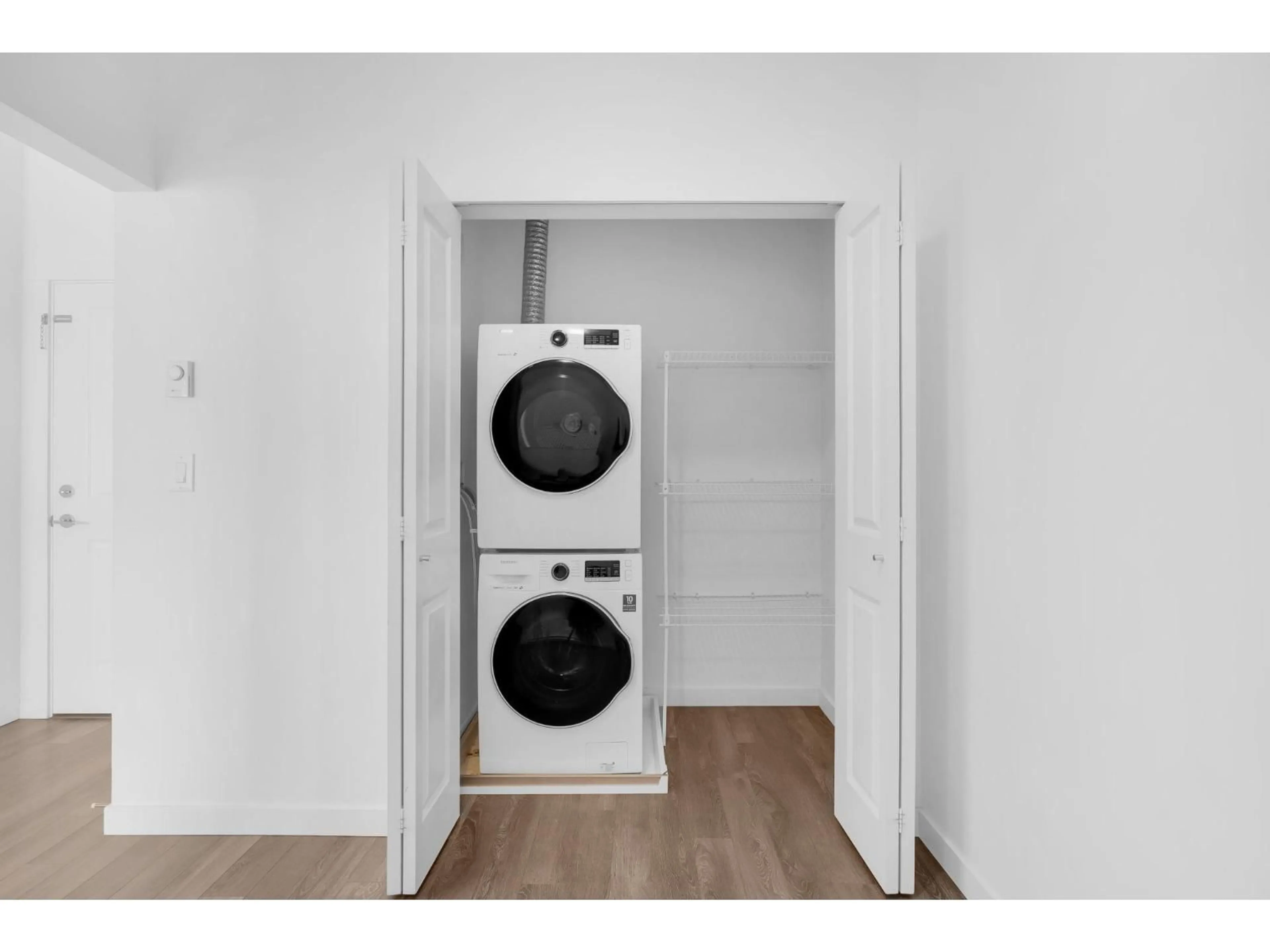Laundry room for 413 - 13628 81A AVENUE, Surrey British Columbia V3W3E2