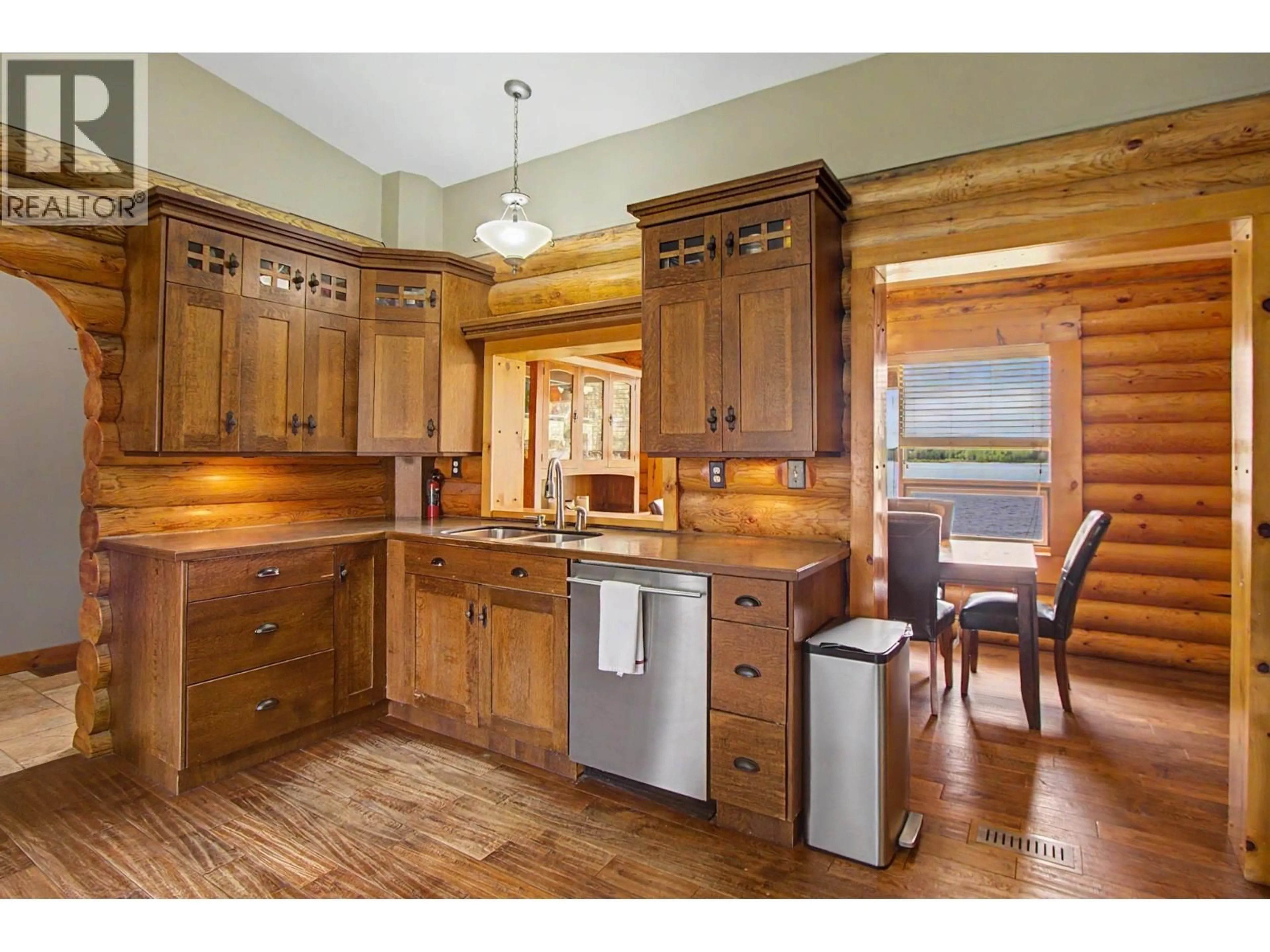 Rustic kitchen, wood/laminate floor for 15110 NUKKO LAKE ESTATES ROAD, Nukko Lake British Columbia V2K5K7
