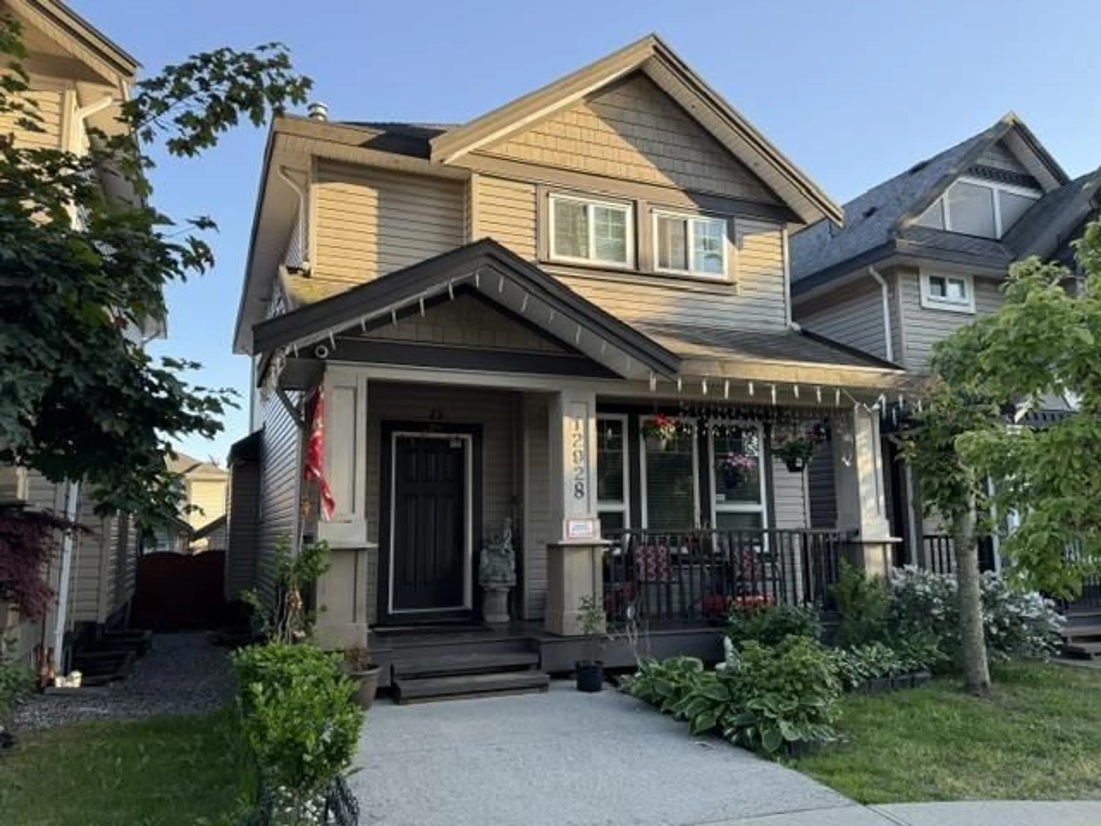 Home with vinyl exterior material, street for 12928 60TH AVENUE, Surrey British Columbia V3X2L5