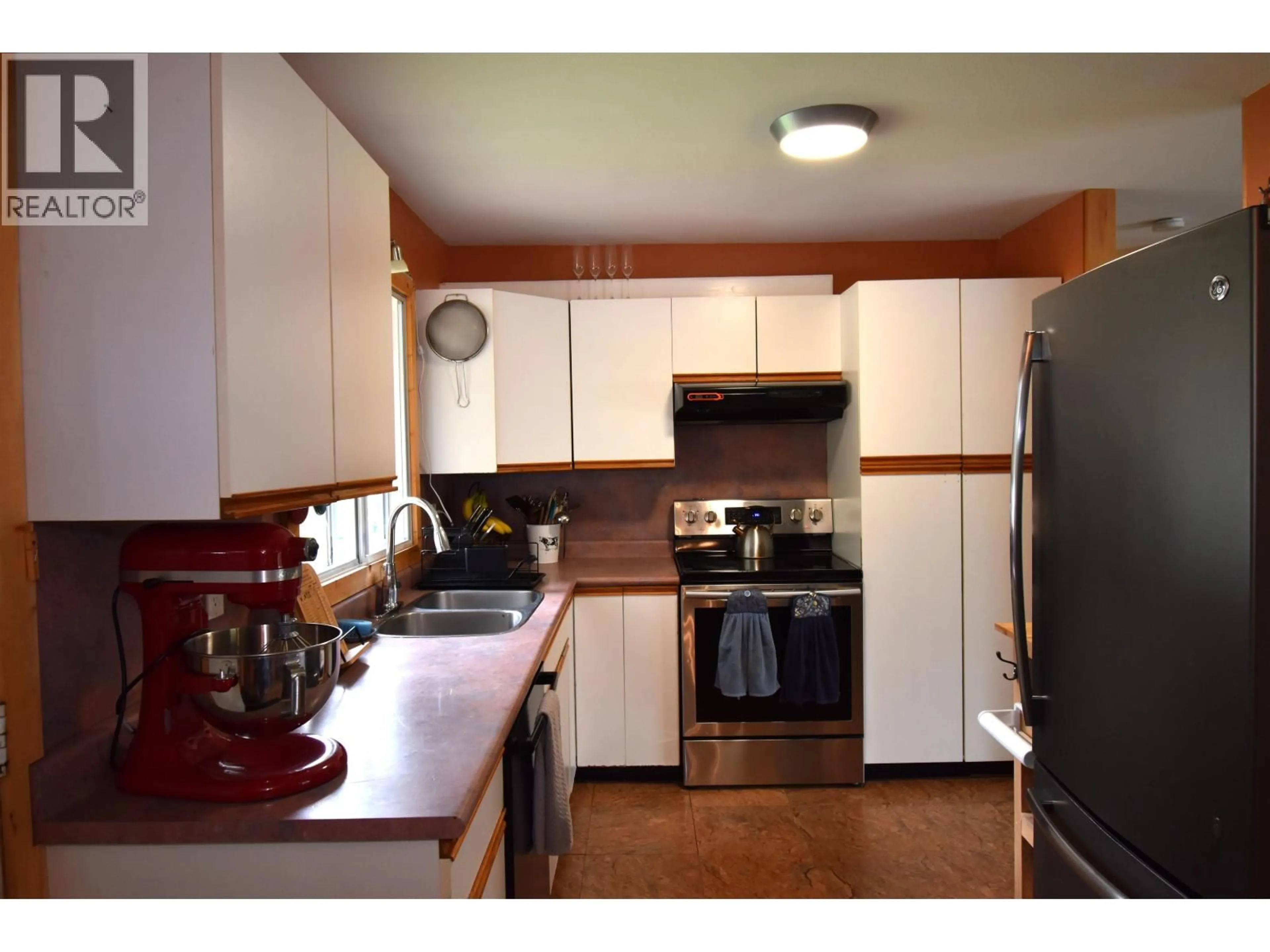 Standard kitchen, wood/laminate floor for 1393 COALMINE ROAD, Telkwa British Columbia V0J2X0