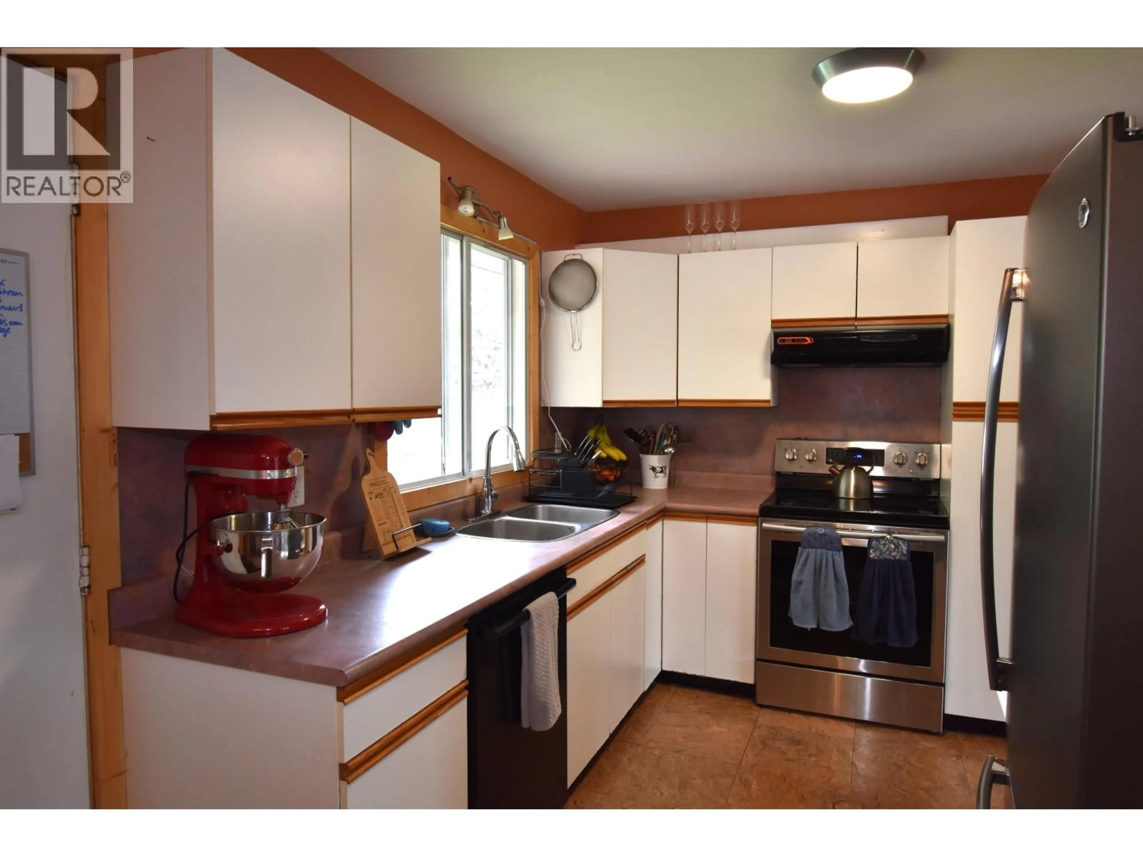 Standard kitchen, wood/laminate floor for 1393 COALMINE ROAD, Telkwa British Columbia V0J2X0