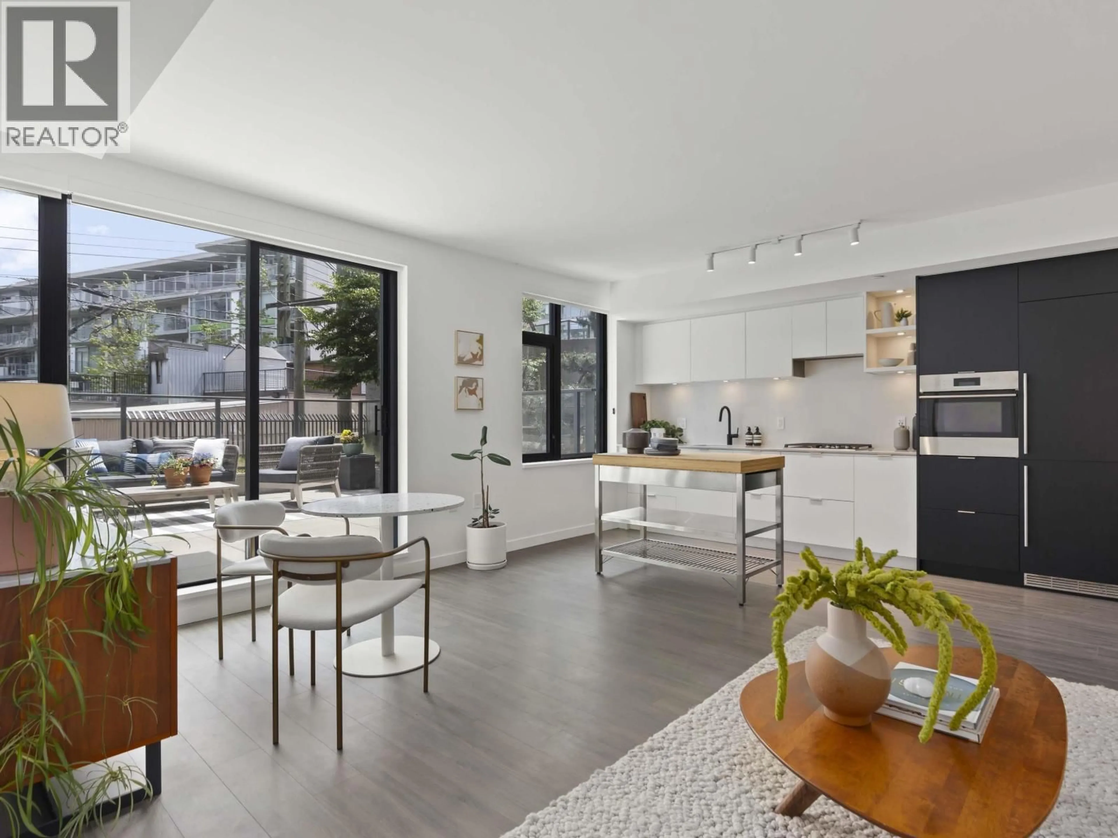 Open concept kitchen, unknown for 301 - 210 5TH AVENUE, Vancouver British Columbia V5T0K1