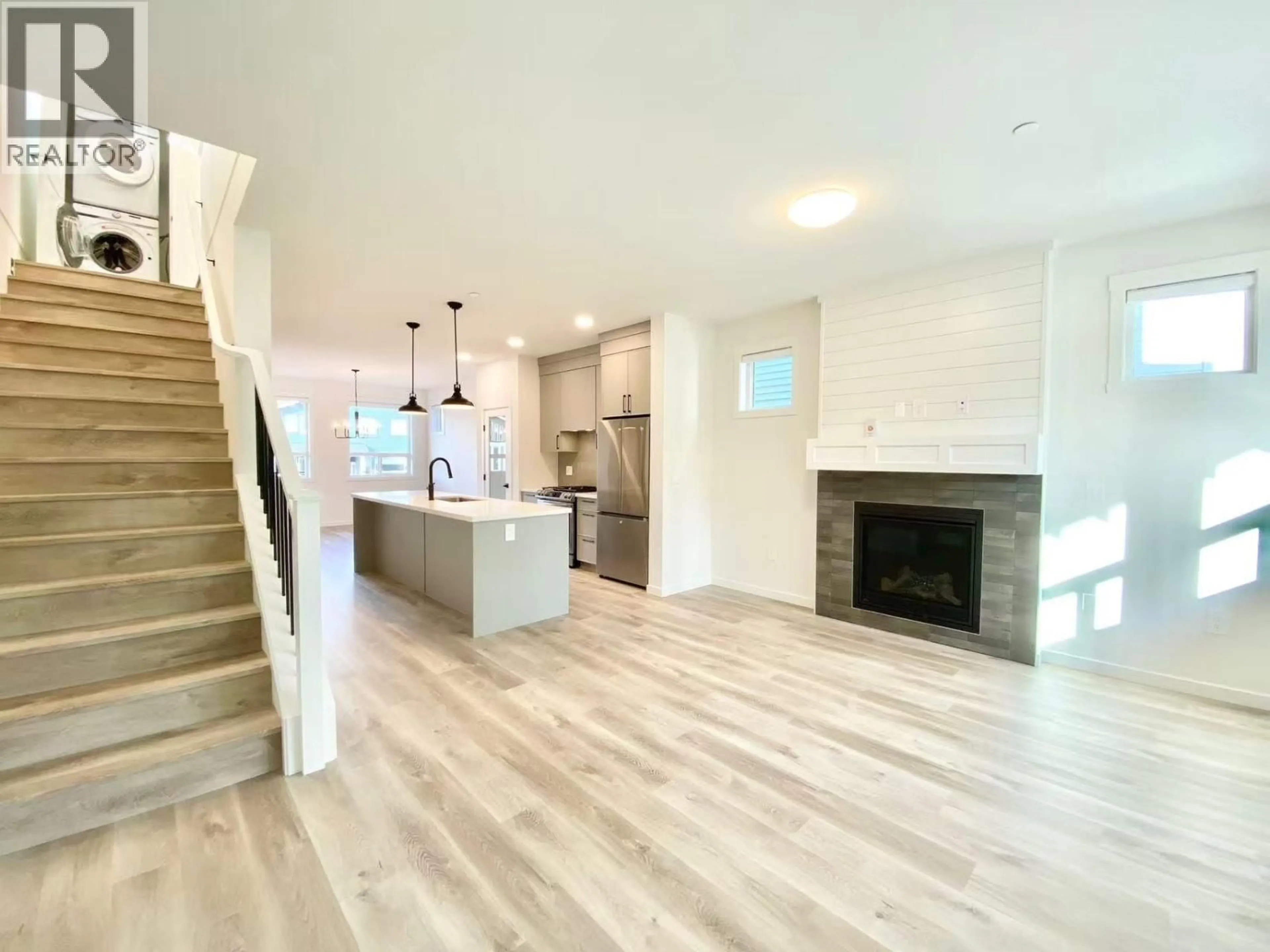 Open concept kitchen, wood/laminate floor for 25069 112 AVENUE, Maple Ridge British Columbia V2W0K6