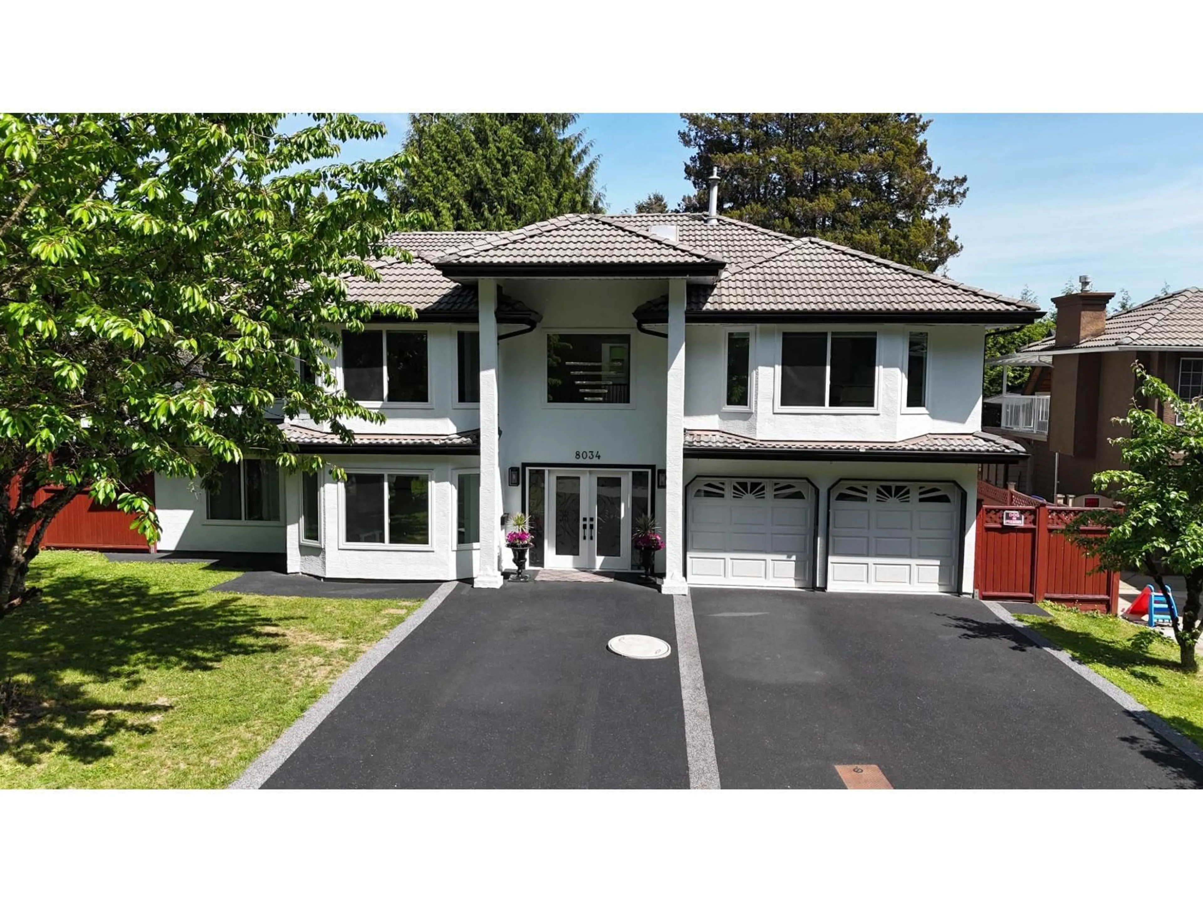 A pic from outside/outdoor area/front of a property/back of a property/a pic from drone, street for 8034 166 STREET, Surrey British Columbia V4N0H1