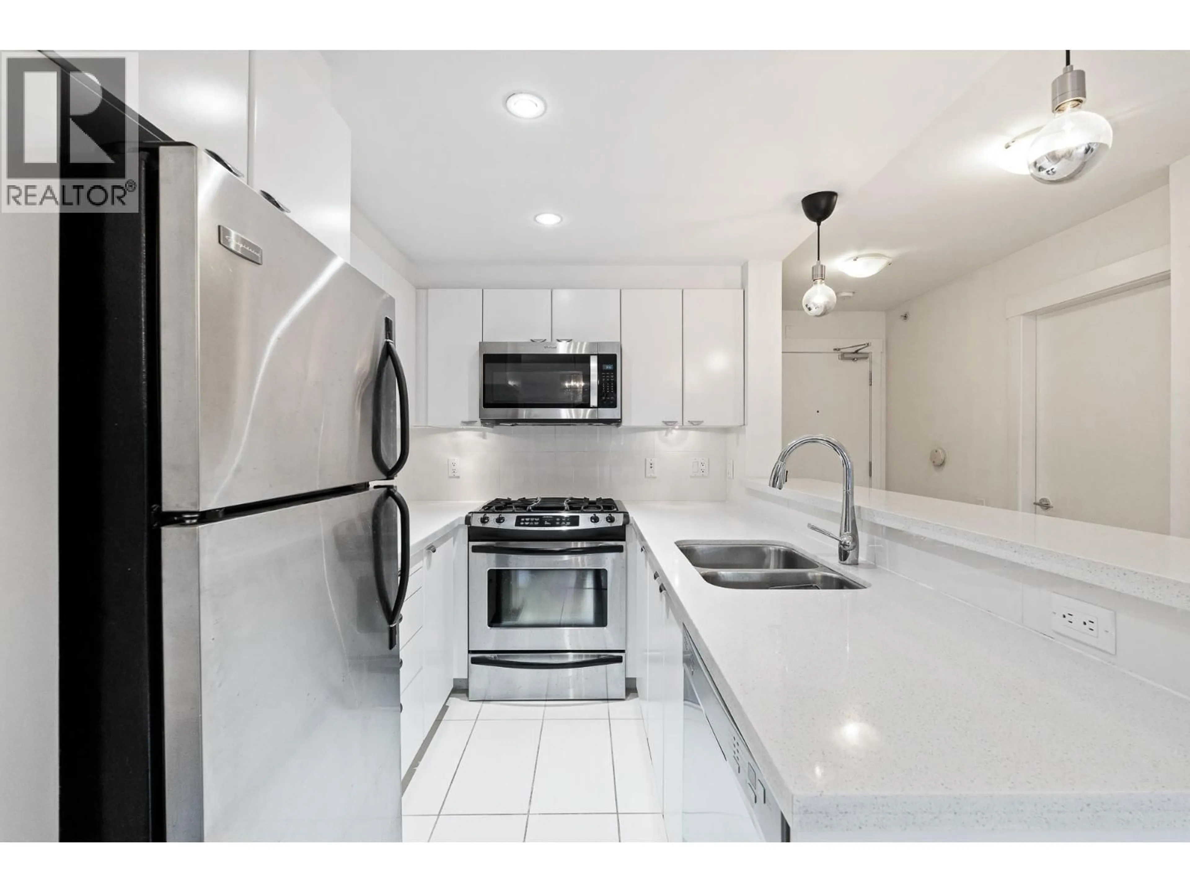 Standard kitchen, ceramic/tile floor for 302 - 160 3RD STREET, North Vancouver British Columbia V7M0A9