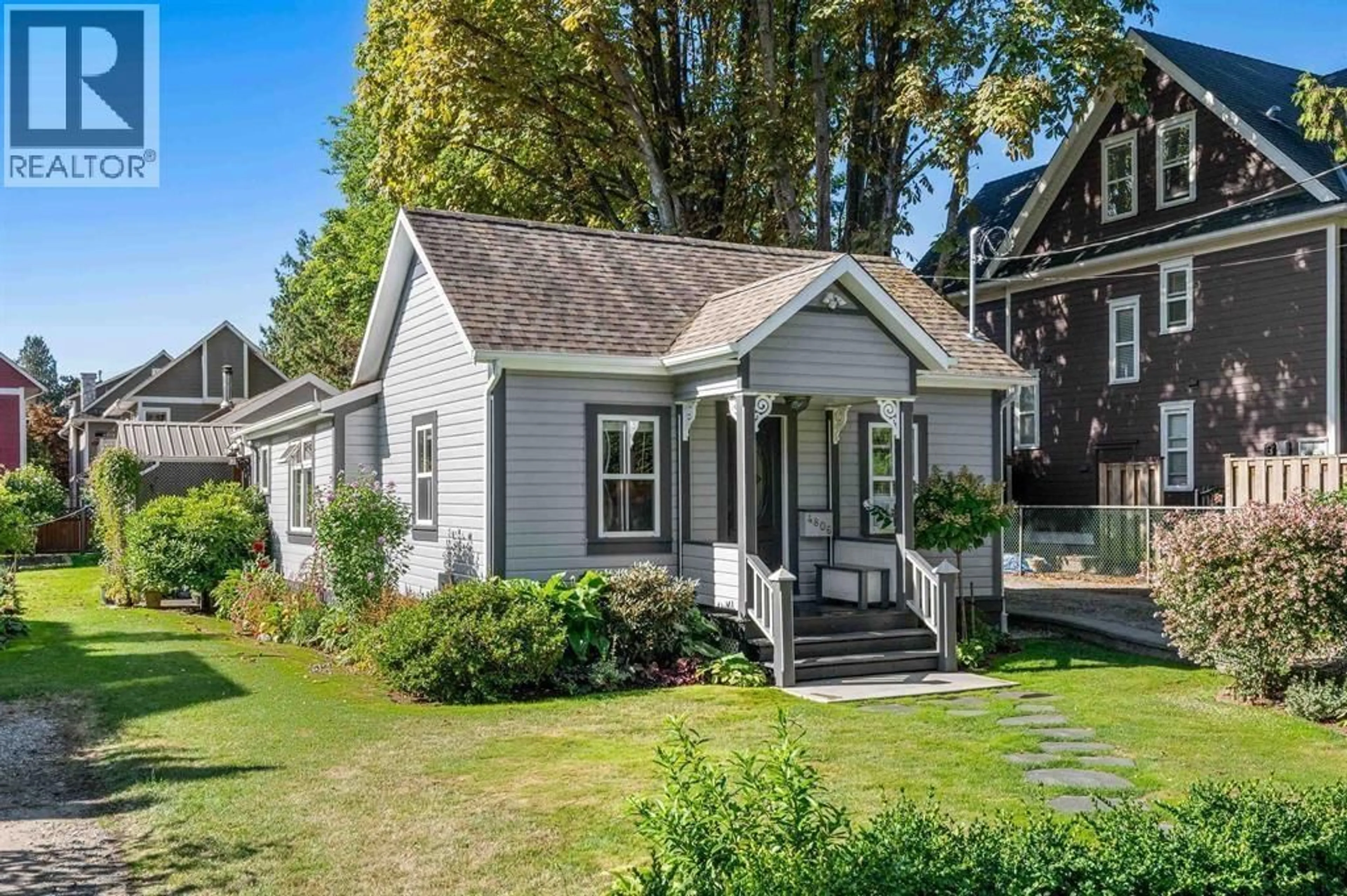 Home with vinyl exterior material, street for 4806 48 AVENUE, Delta British Columbia V4K1V1