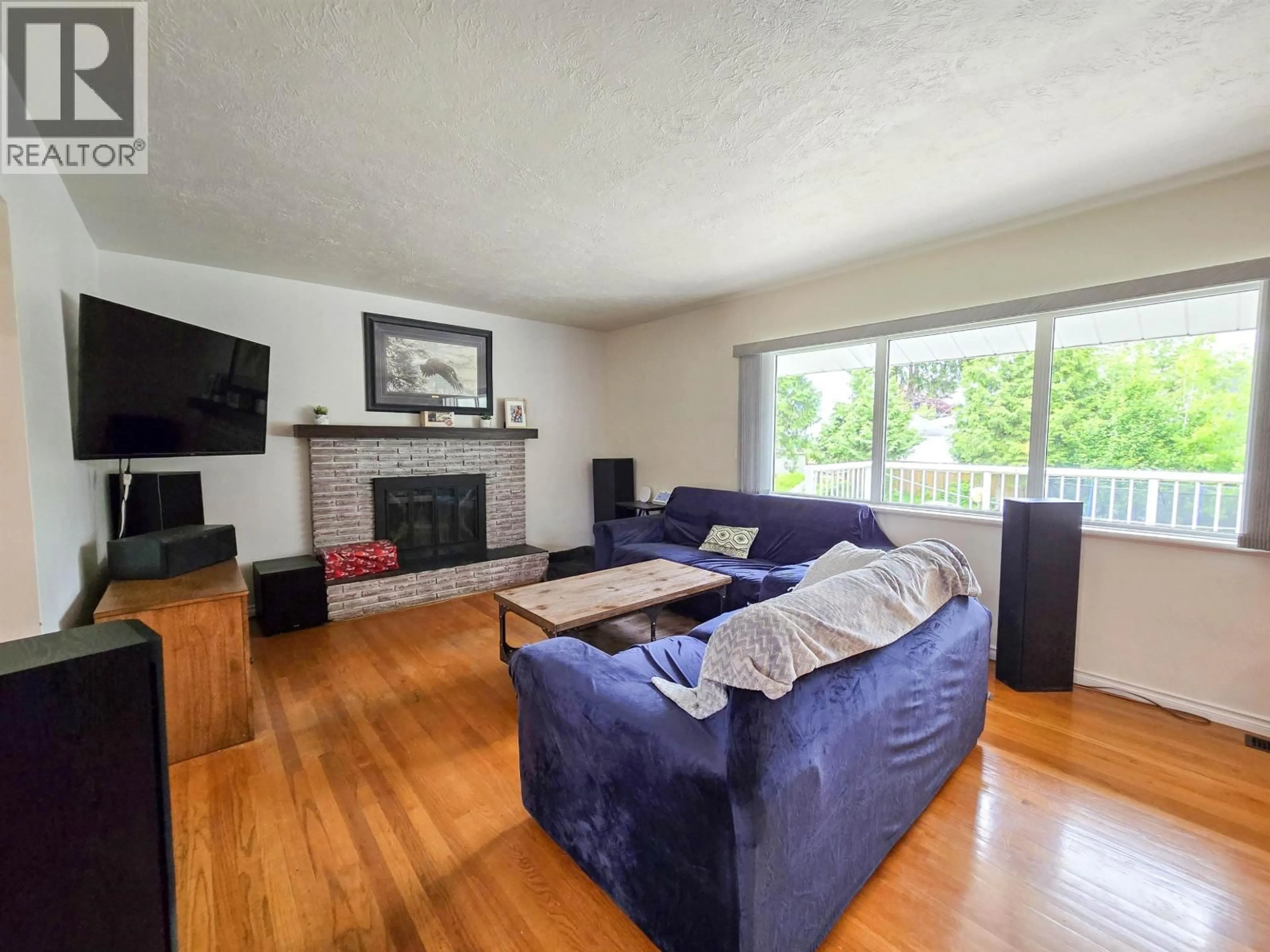 Living room with furniture, wood/laminate floor for 72 STEIN STREET, Kitimat British Columbia V8C1J1