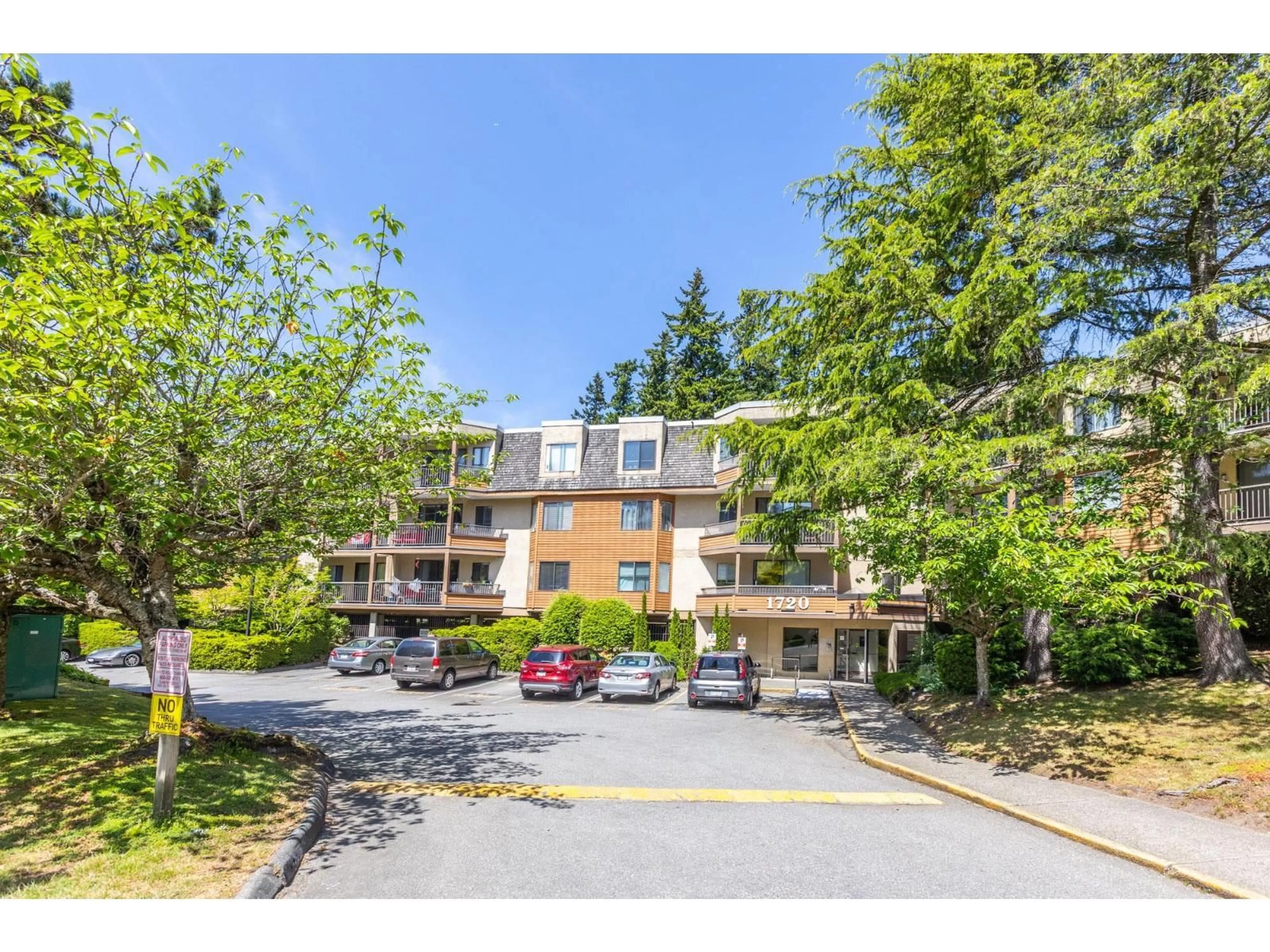 A pic from outside/outdoor area/front of a property/back of a property/a pic from drone, mountain view for 308 - 1720 SOUTHMERE CRESCENT, Surrey British Columbia V4A6E3