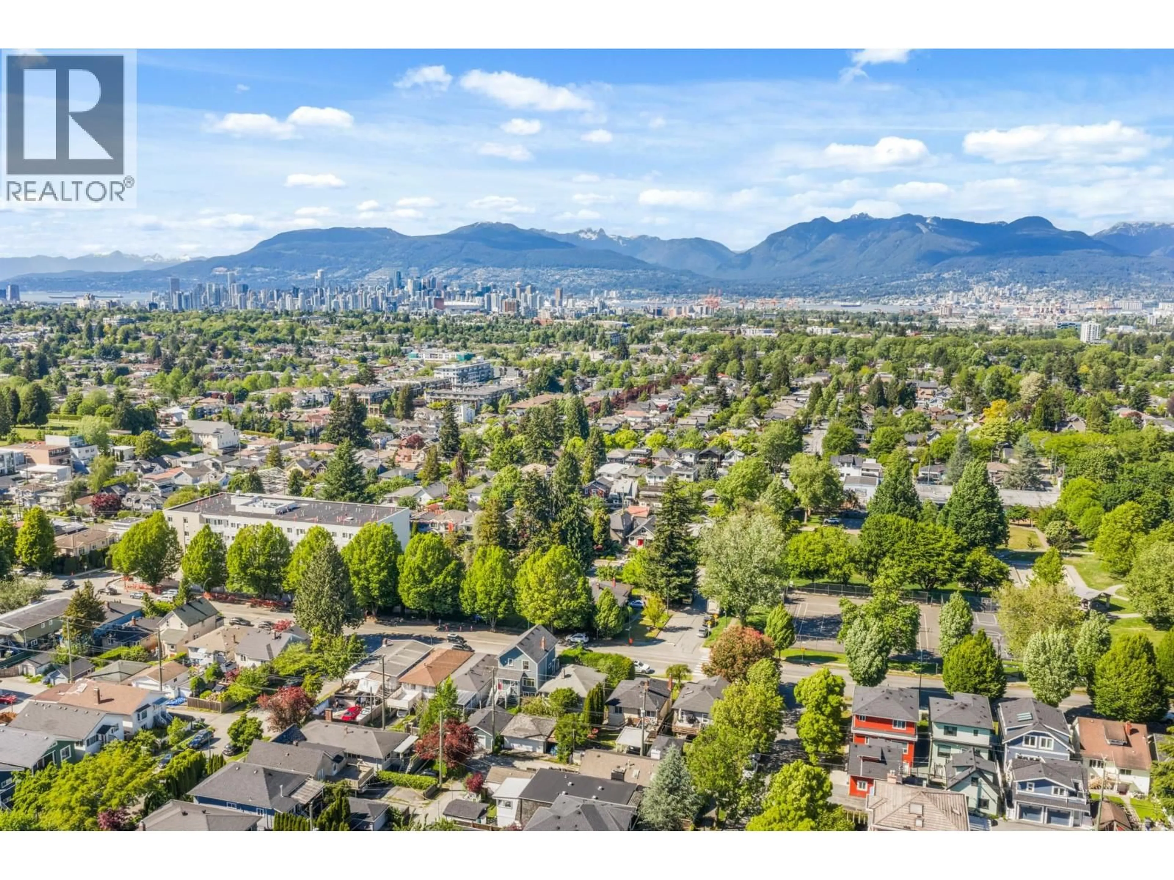 A pic from outside/outdoor area/front of a property/back of a property/a pic from drone, mountain view for 880 33RD AVENUE, Vancouver British Columbia V5V3A5