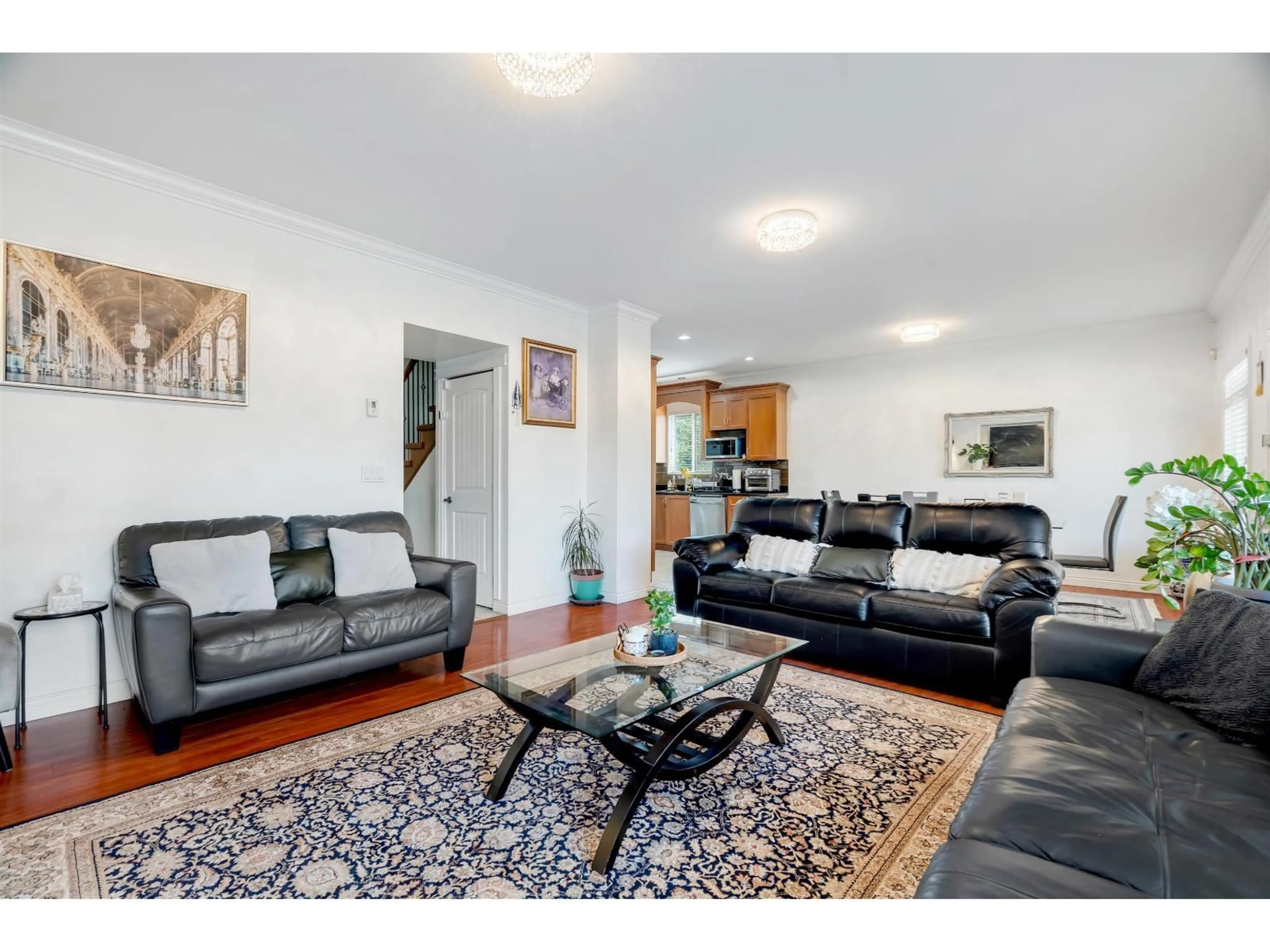 Living room with furniture, wood/laminate floor for 27685 FRASER HIGHWAY, Abbotsford British Columbia V4X1M3